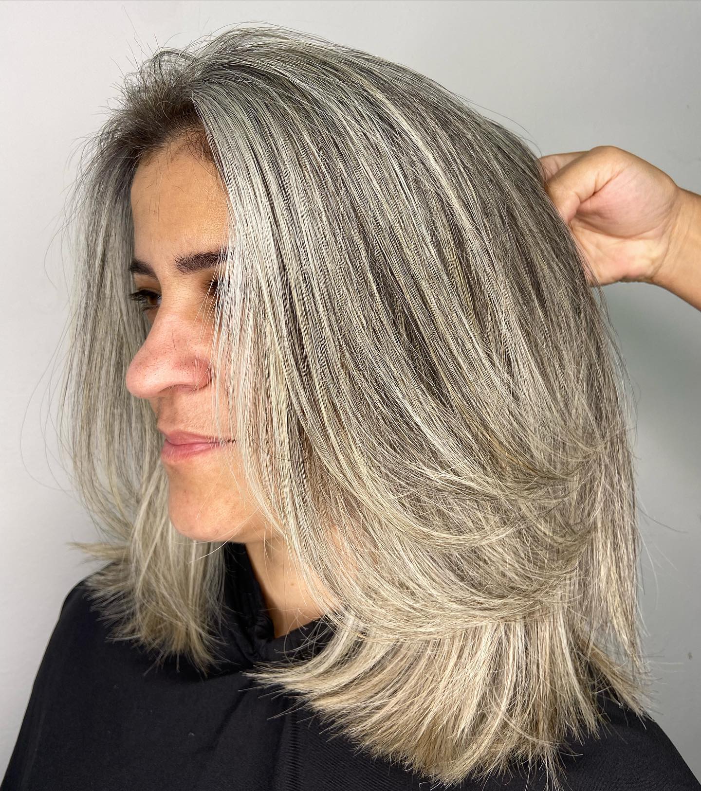 Textured Shoulder-Length Bob with Bright Silver Highlights