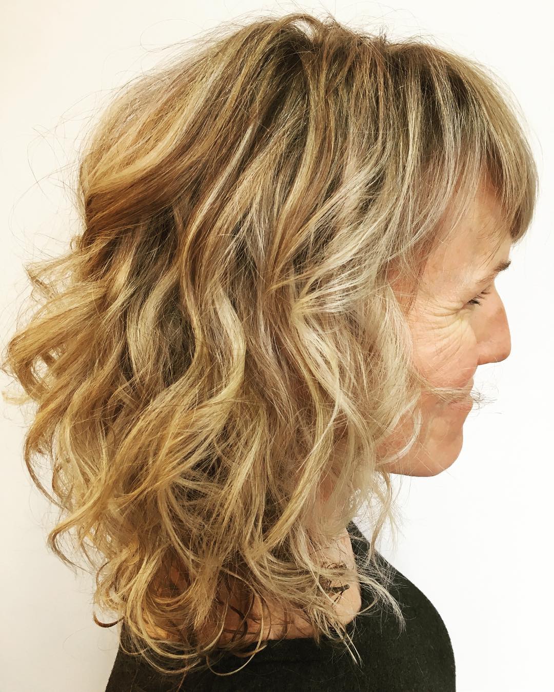 Textured Shoulder-Length Bob with Loose Waves