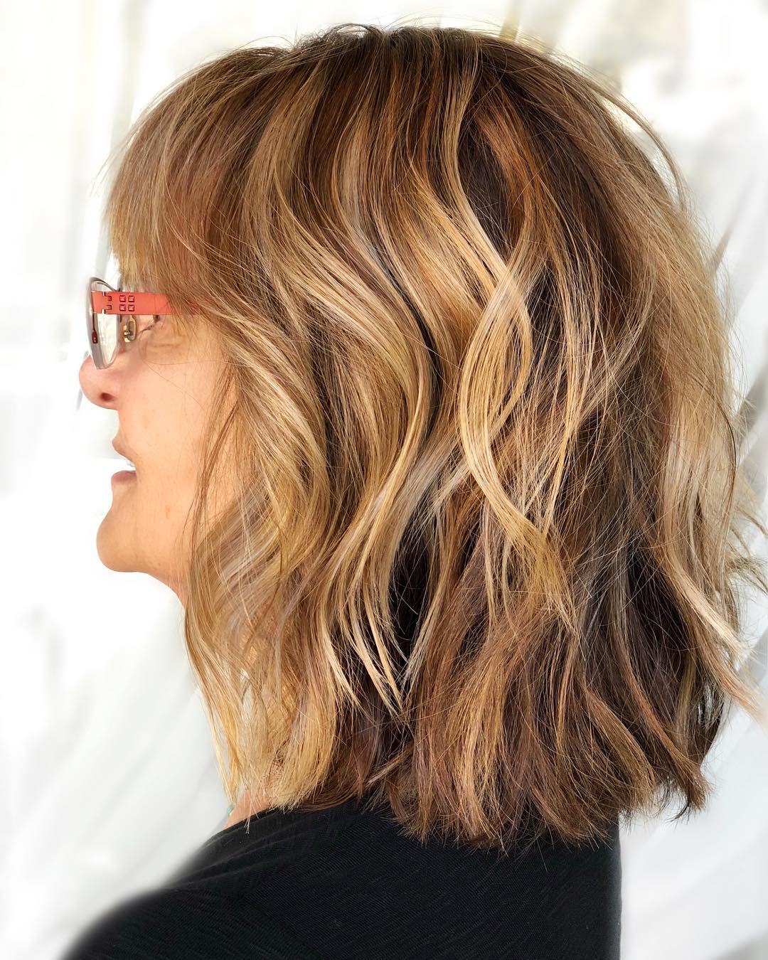 Textured Shoulder-Length Bob with Warm Caramel Highlights