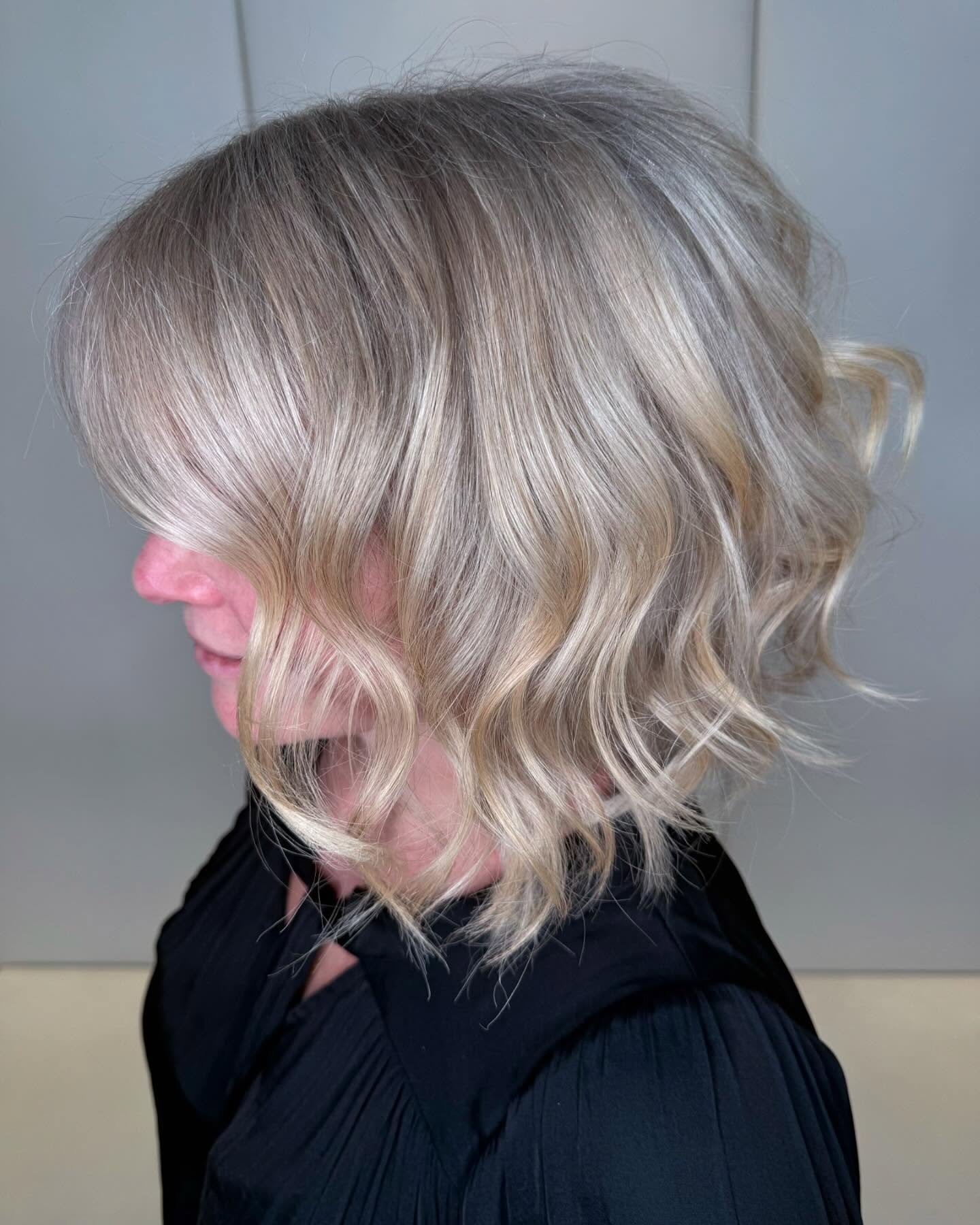 Textured Ash Blonde Graduated Bob with Soft Waves