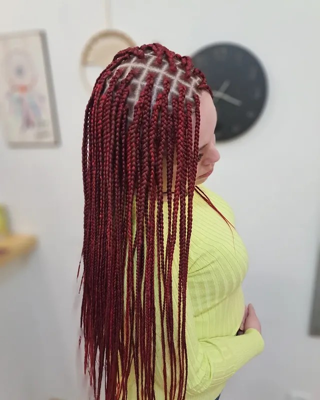 Bold Deep Red Box Braids with Intricate Parting