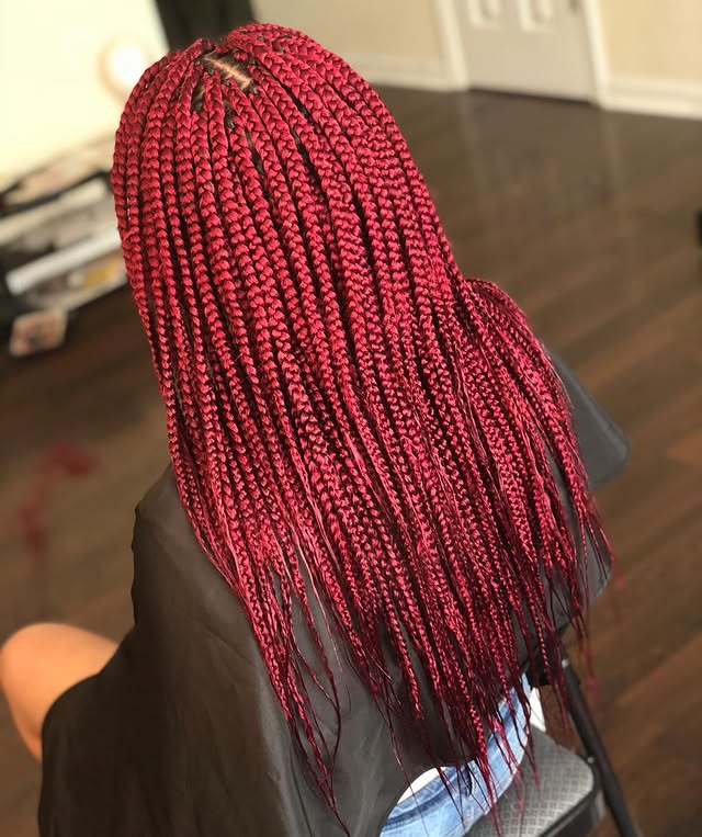 Bold Fiery Red Box Braids with a Sleek Finish