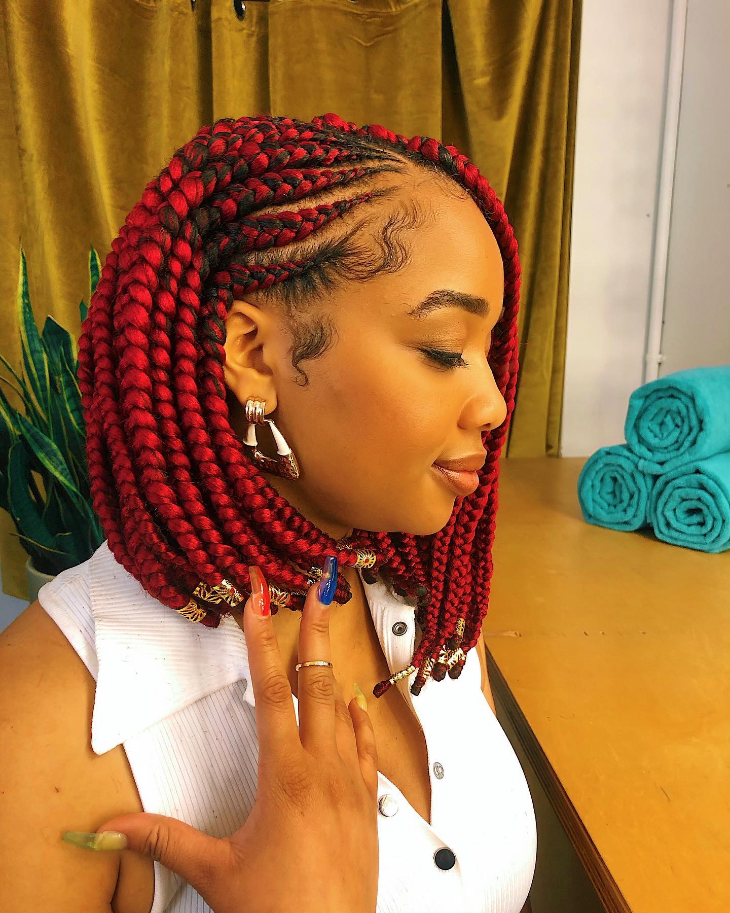 Bold Red Box Braids with Curled Ends
