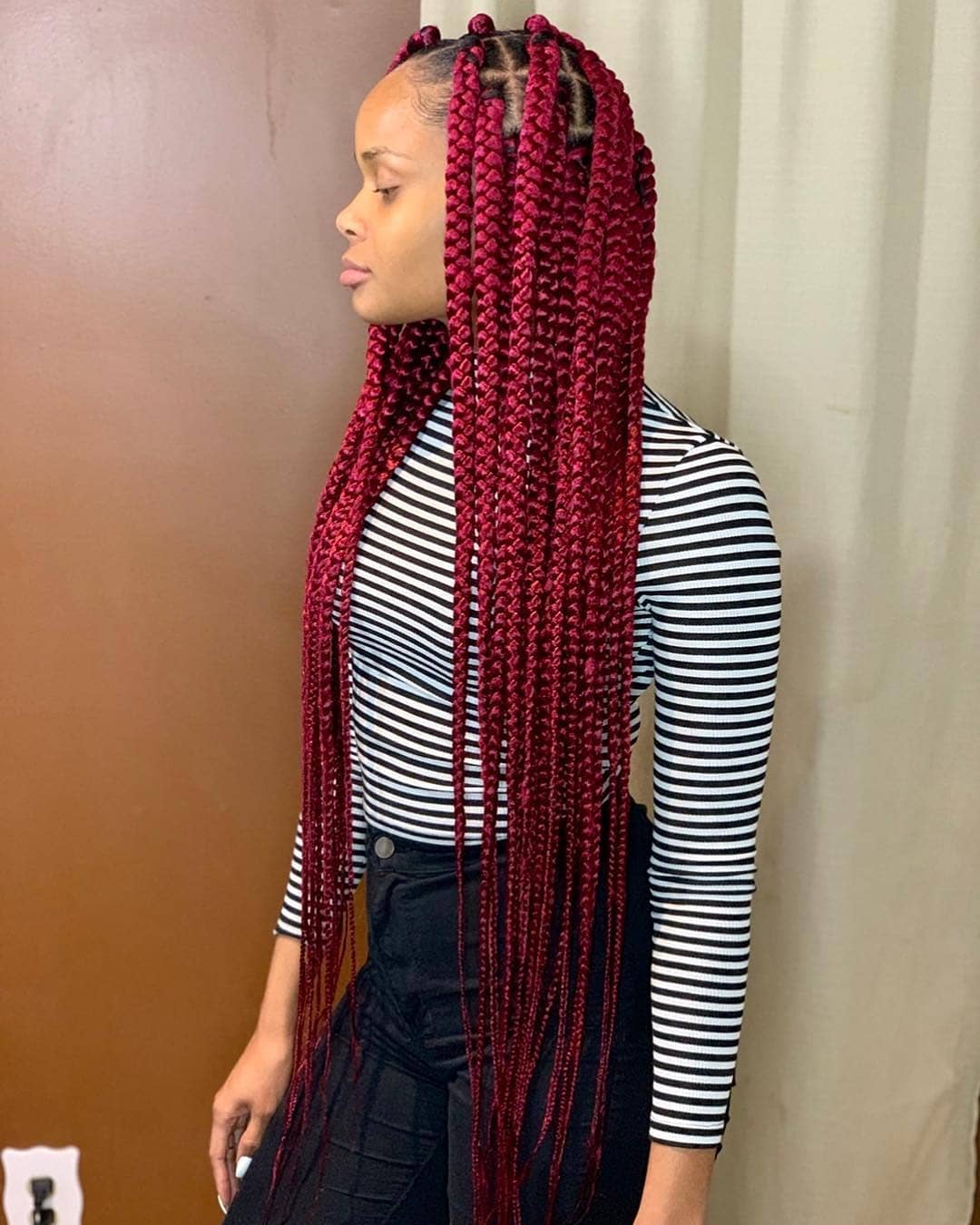 Captivating Long Red Box Braids with Defined Parting
