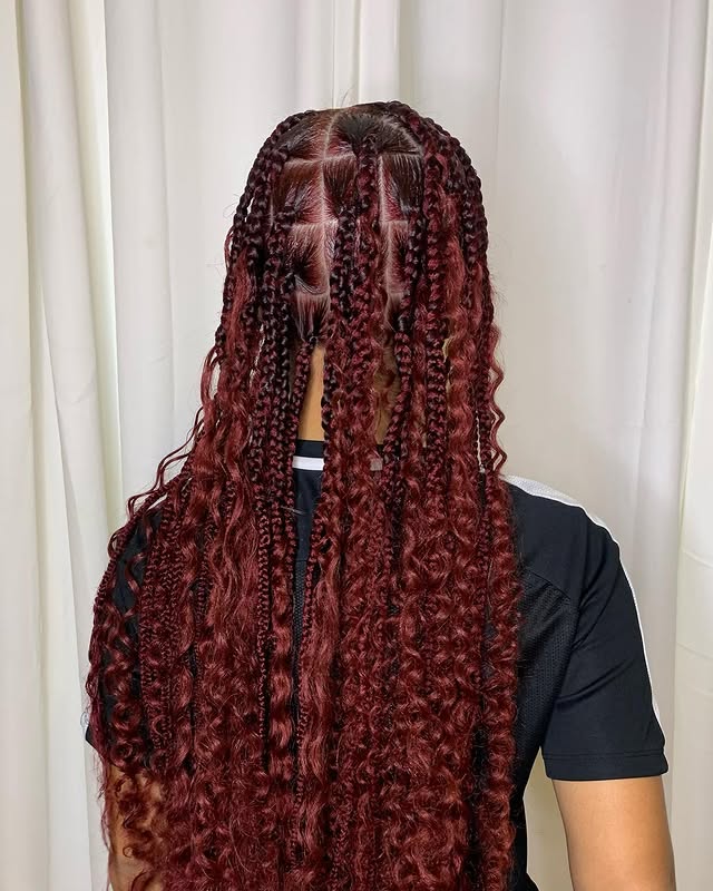 Dynamic Red Box Braids with Flirty Curls