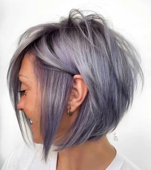 edgy textured stacked bob with lavender highlights