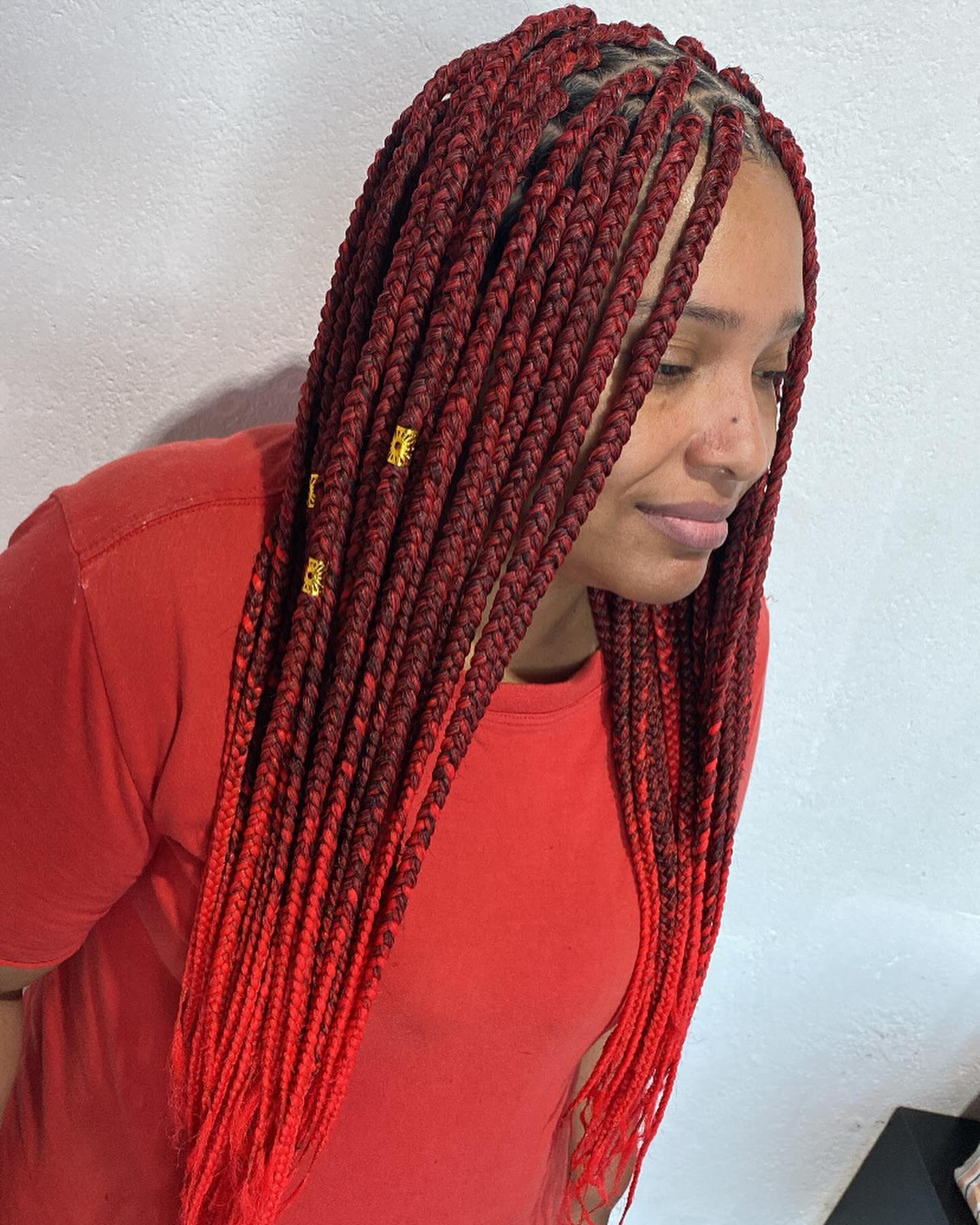 Radiant Red Box Braids with Golden Accents