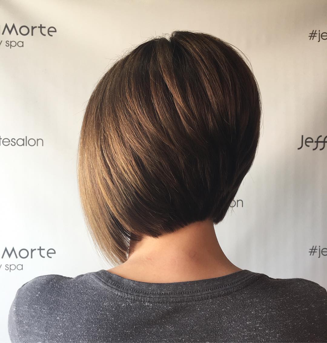 Sleek Inverted Stacked Bob with Soft Highlights