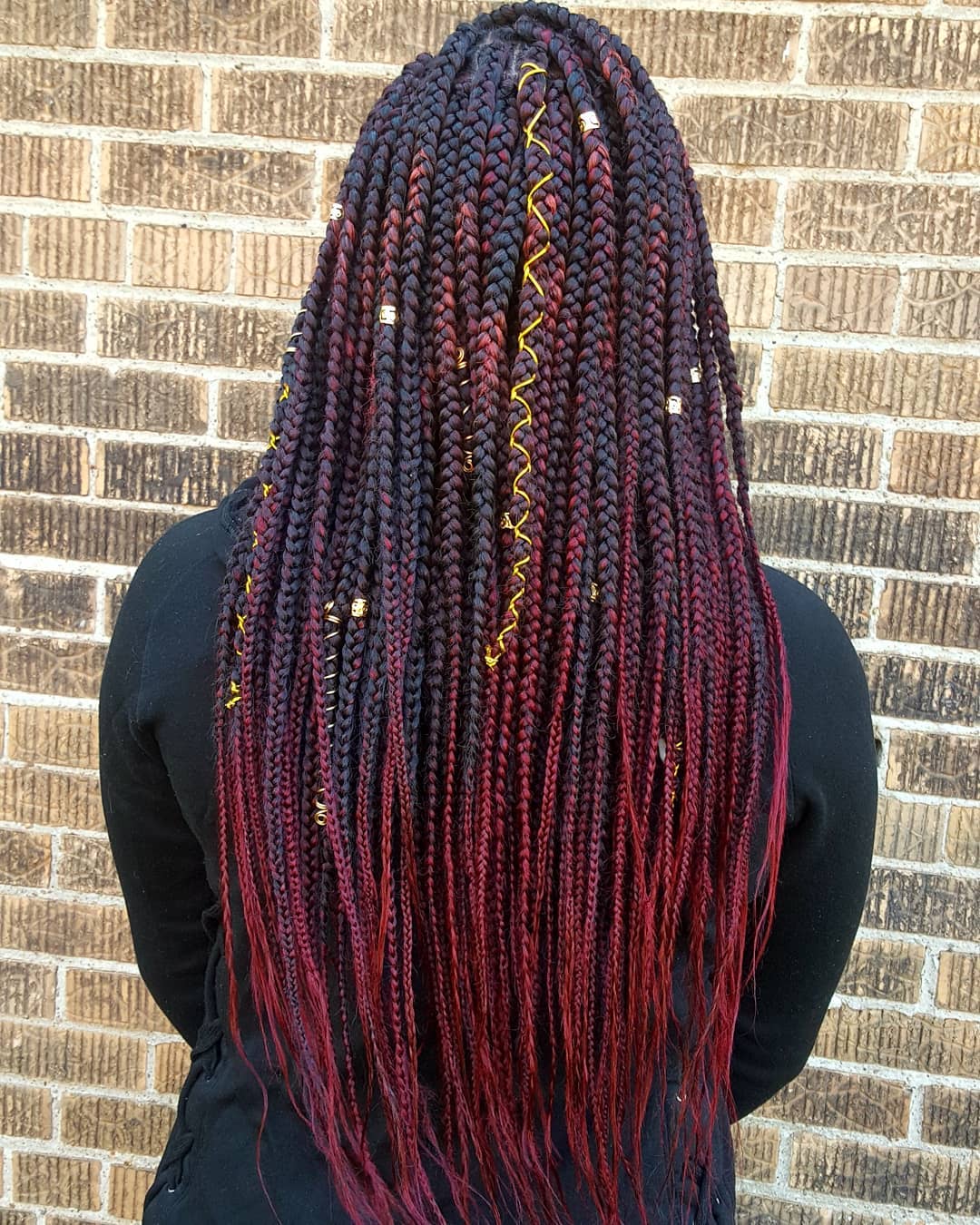 Stunning Long Red Box Braids with Unique Accents