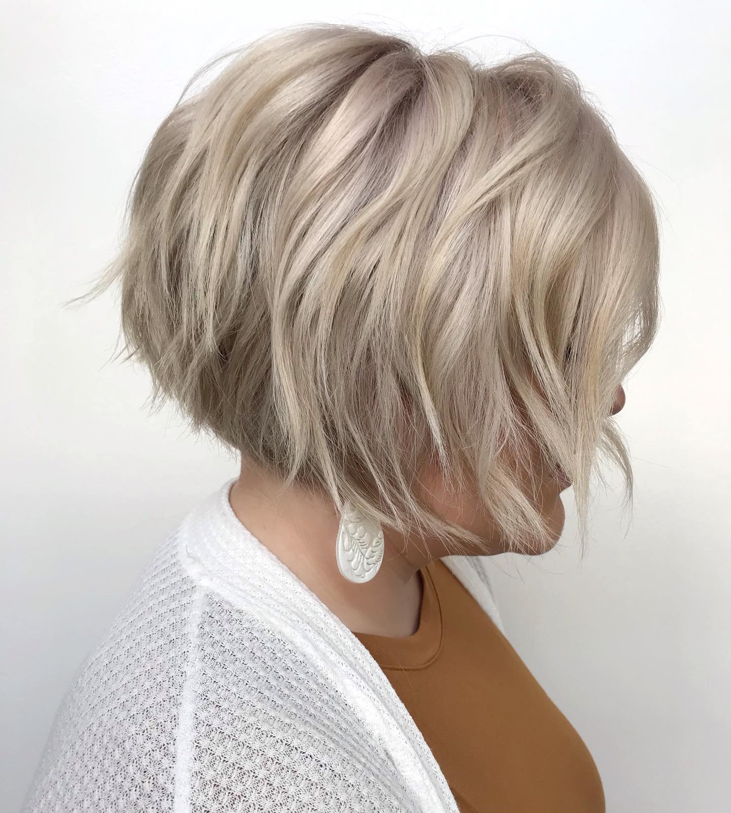 Textured Beachy Stacked Bob with Soft Platinum Highlights