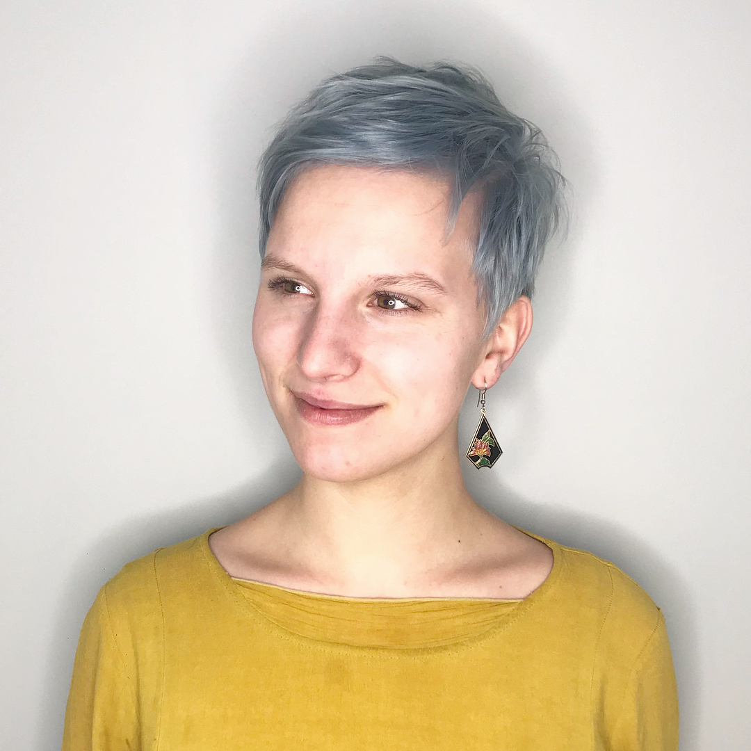 Trendy Soft Blue Messy Pixie Cut