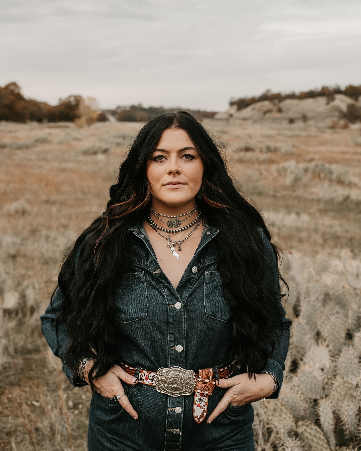 Bold Long Layered Cowgirl Cut with Subtle Highlights