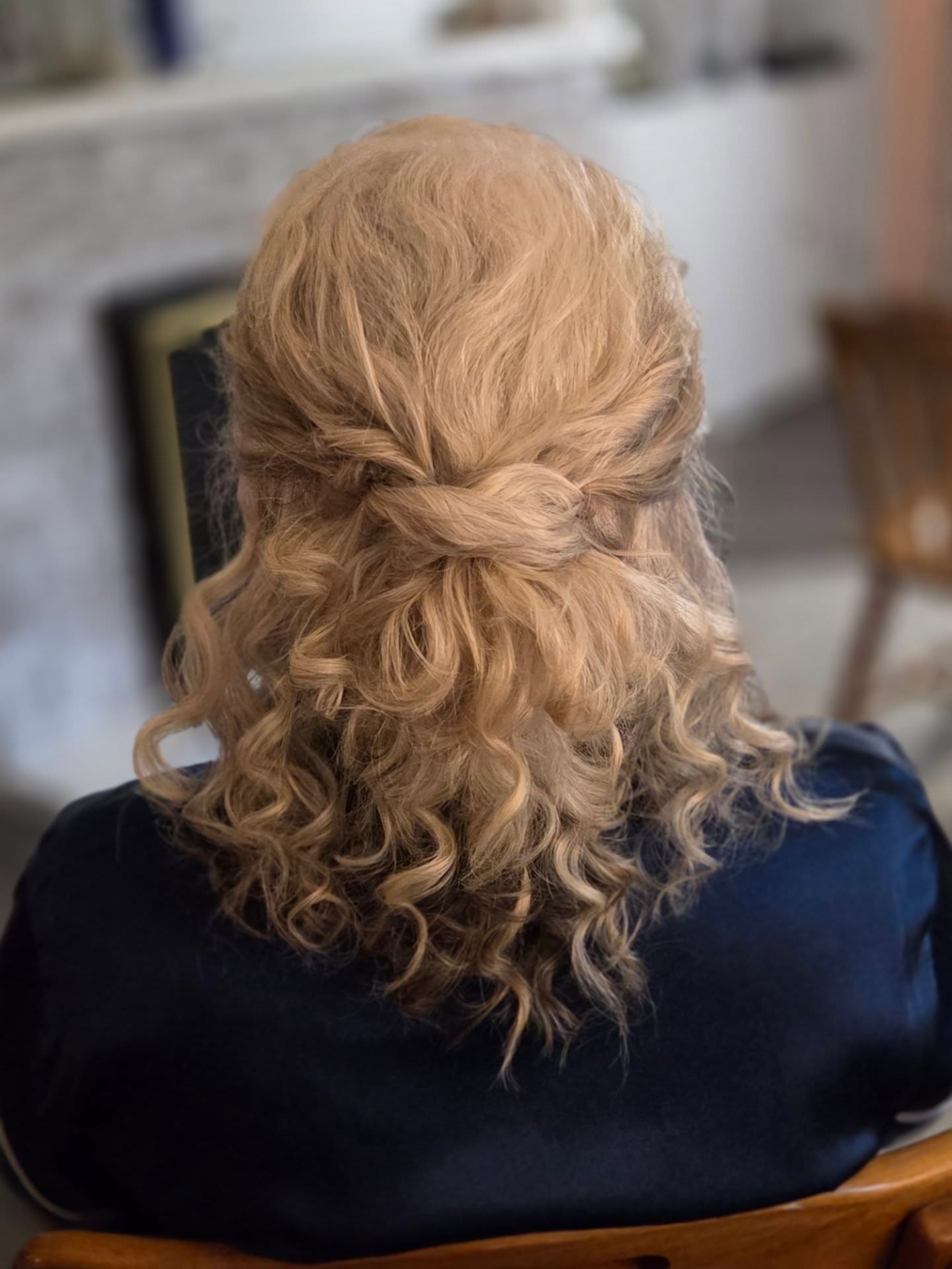 Charming Curly Half-Up Style with Soft Highlights