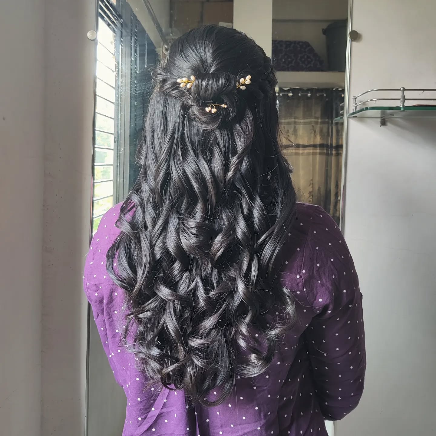 Elegant Long Layered Curls with Accent Twist