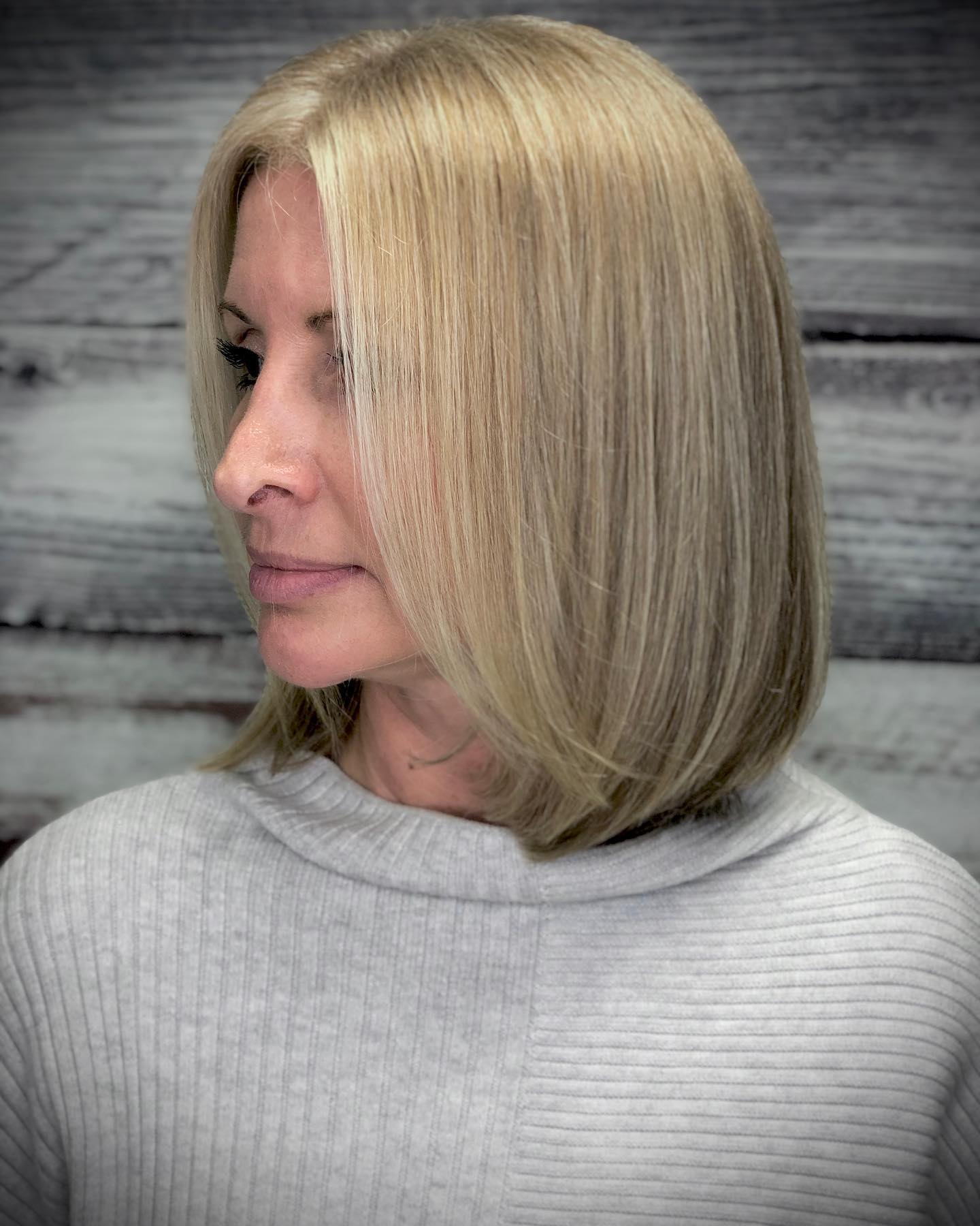 Sleek Blonde Bob with Subtle Face-Frame Layers