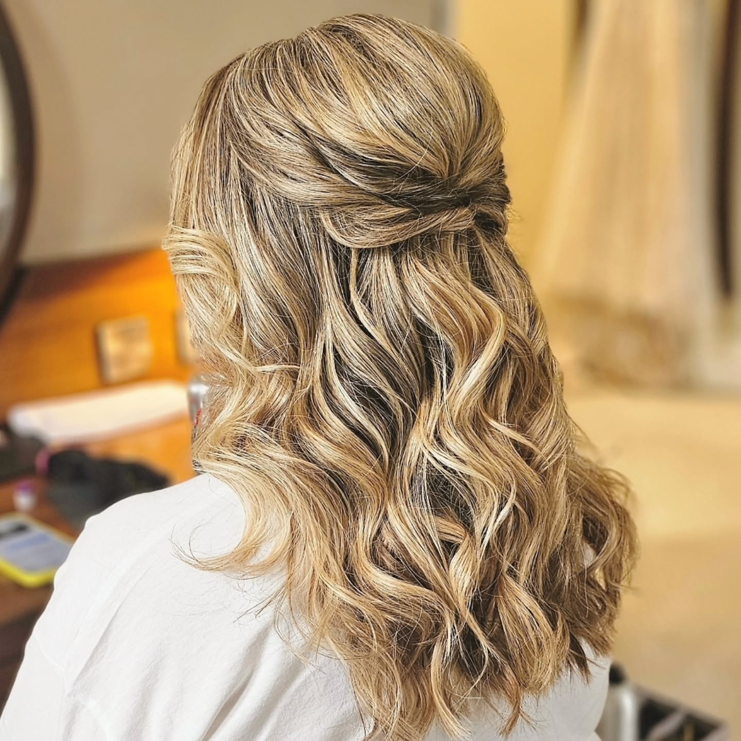 Stylish Half-Up Wavy Cut with Subtle Highlights
