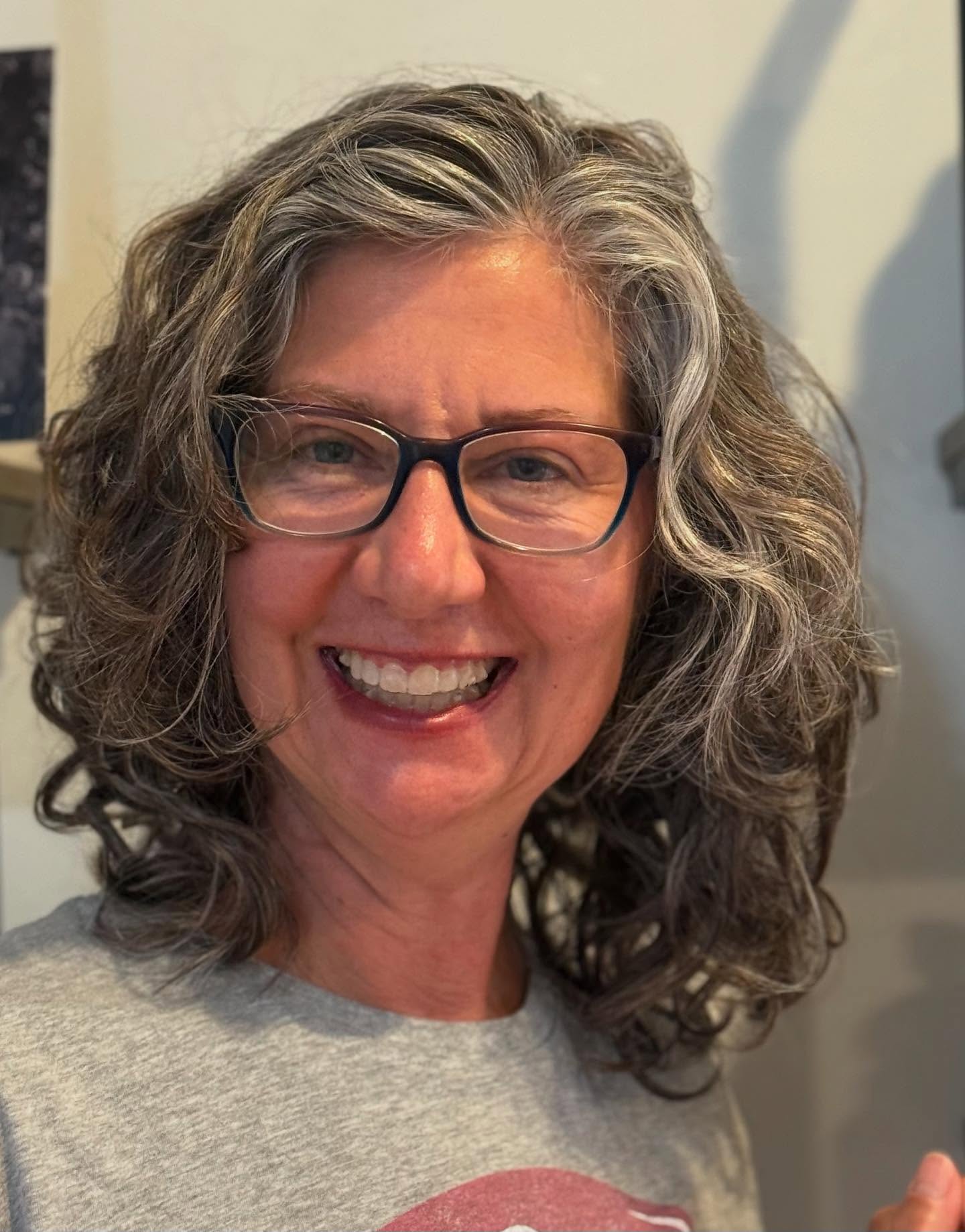 Textured Curly Layers with Face-Framing Dimensions