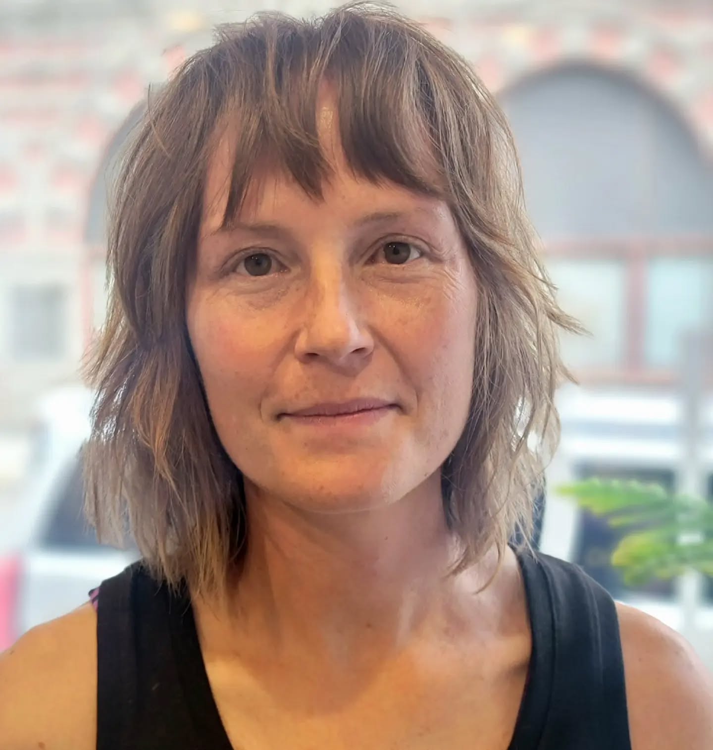 Textured Shoulder-Length Cowgirl Cut with Soft Bangs