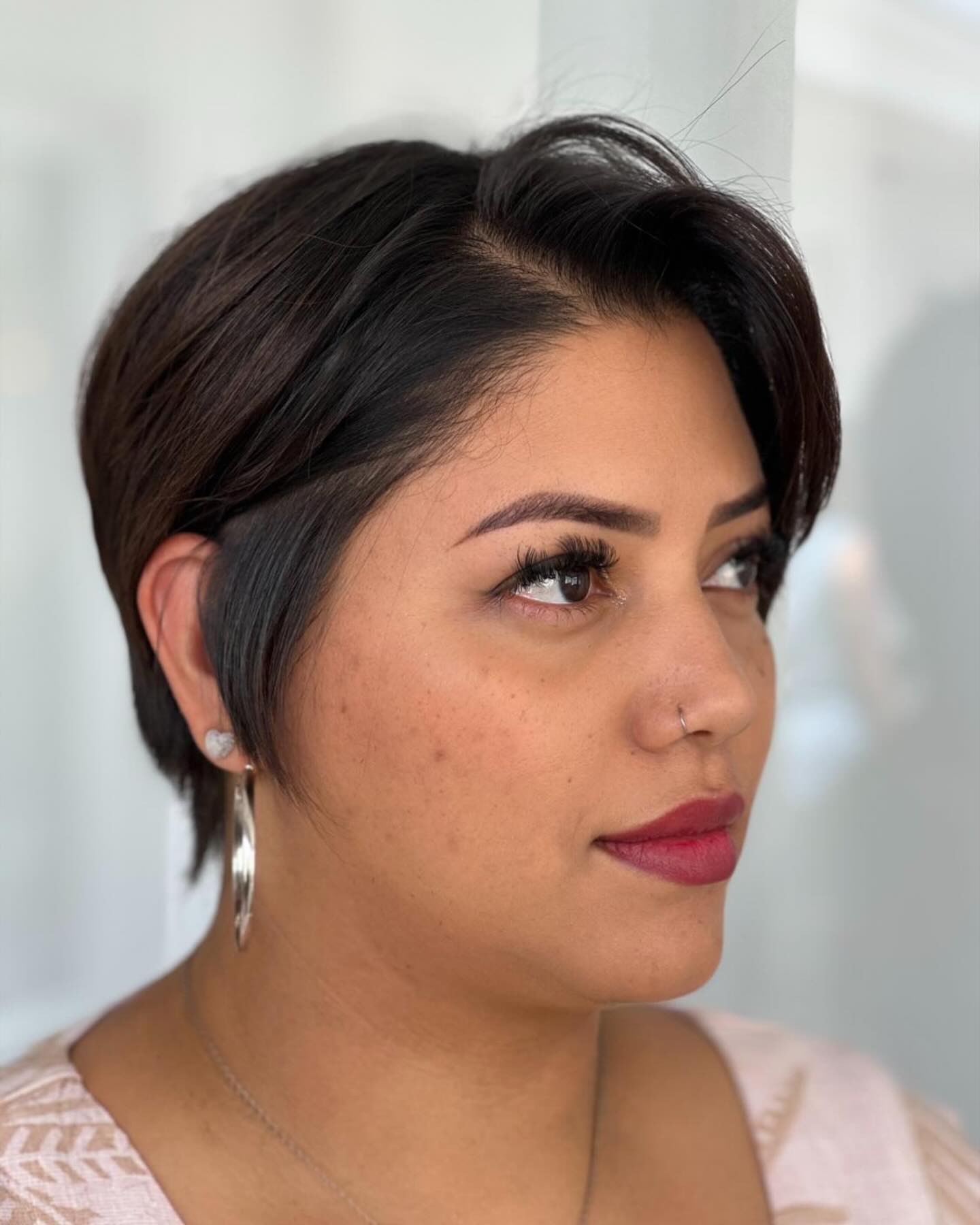 Contemporary Textured Pixie Cut with Side-Swept Bangs