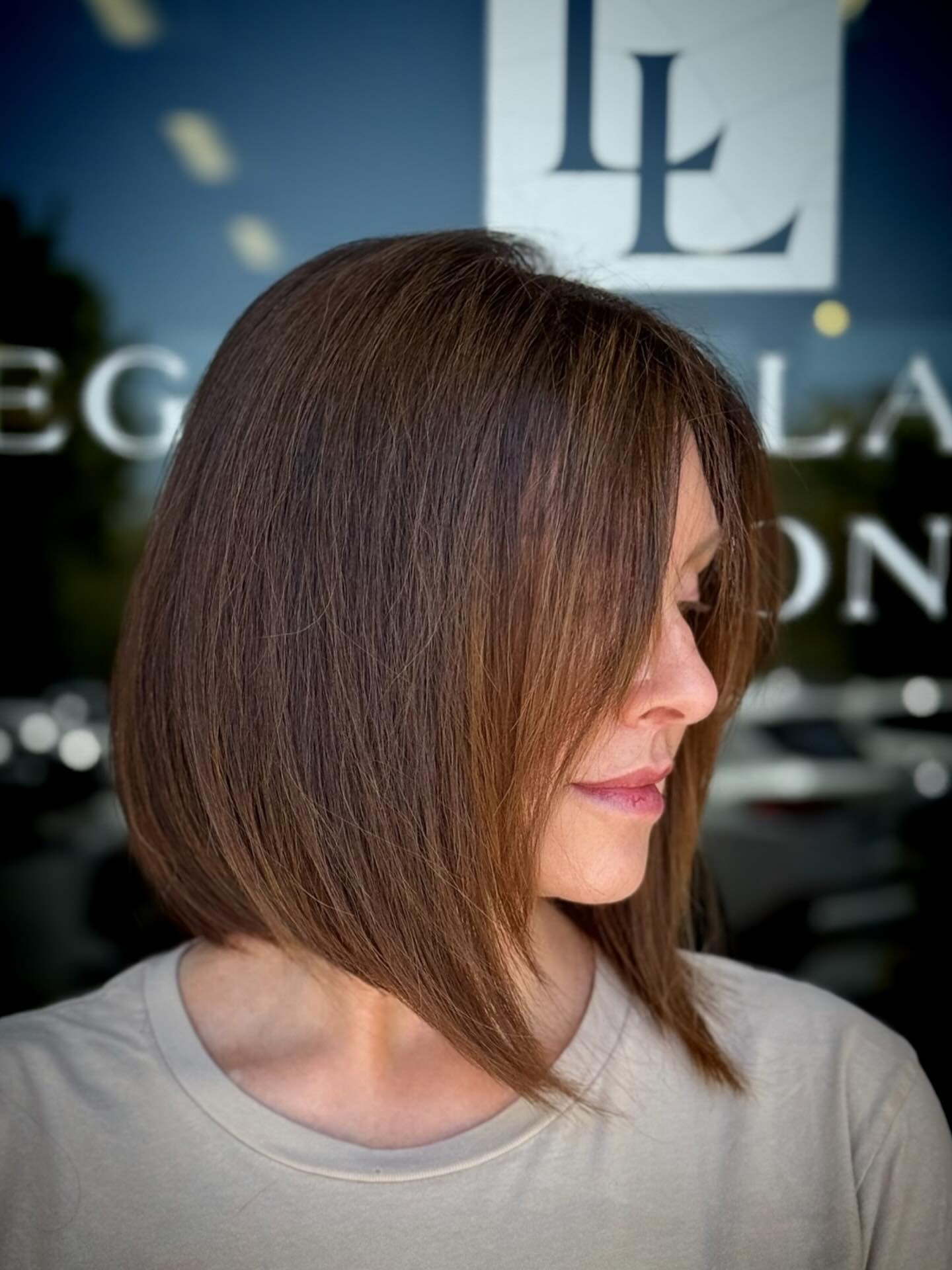 Modern Textured Neck-Length Bob with Long Bangs