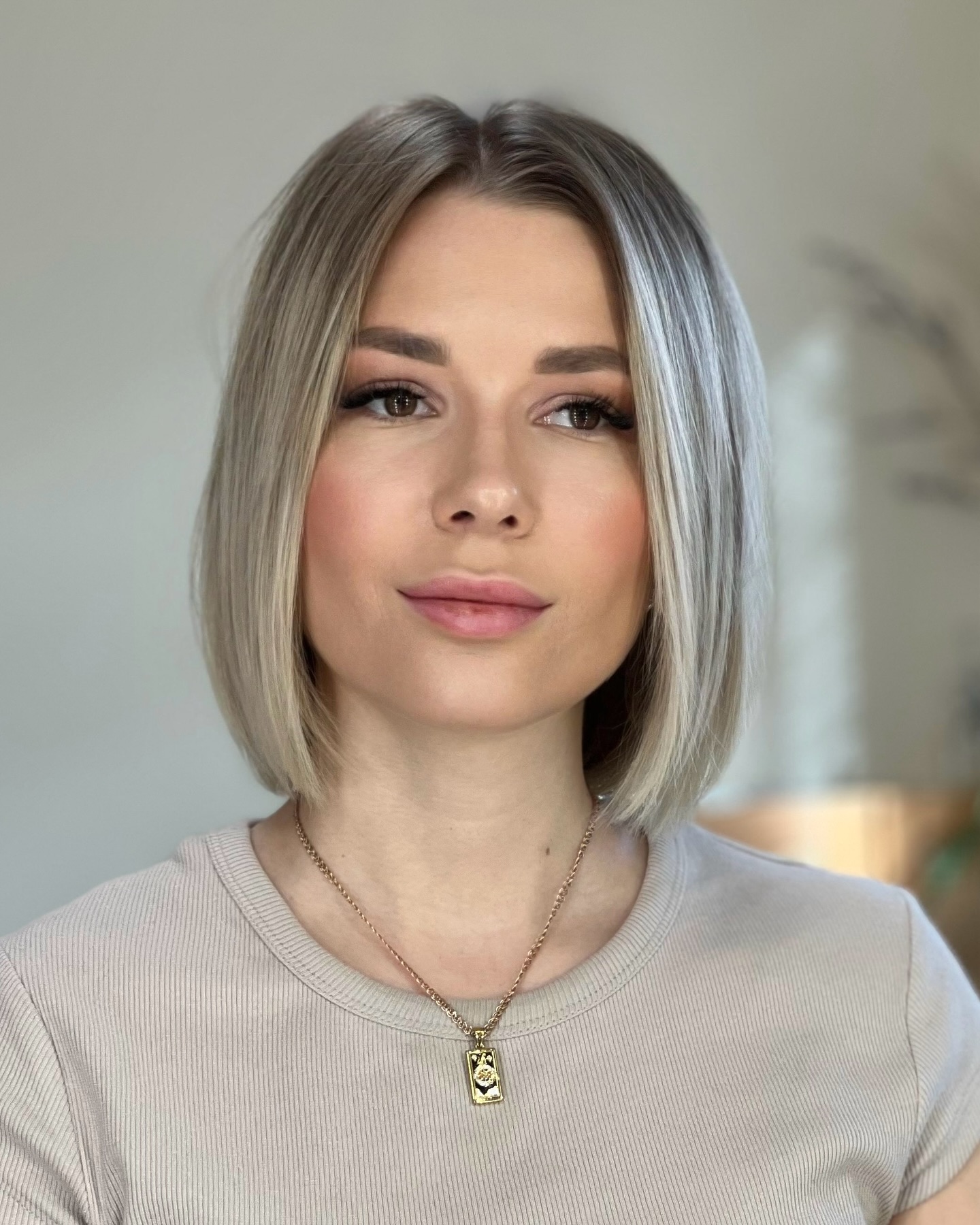 Polished Neck-Length Bob with Subtle Face-Framing Bangs