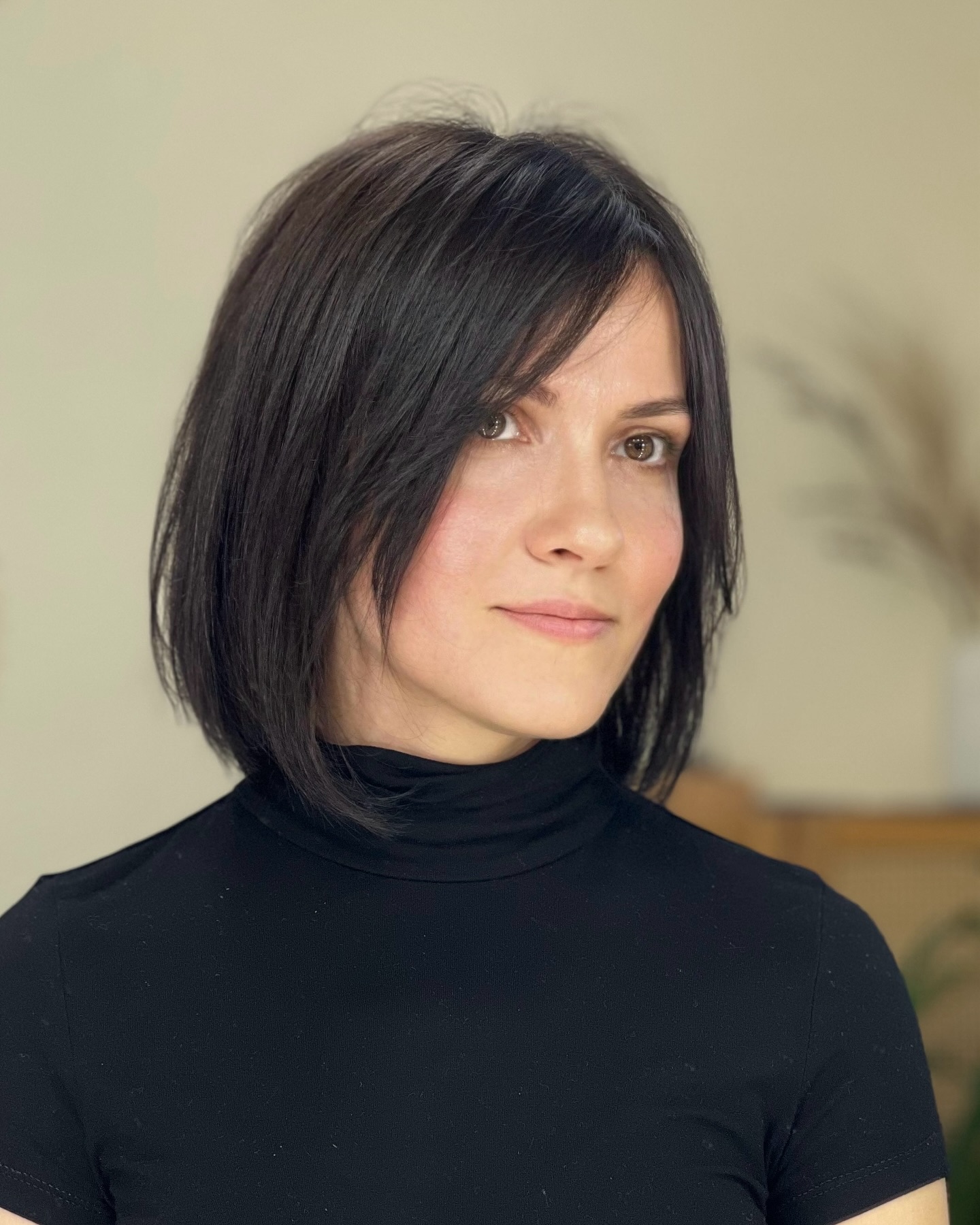 Stylish Textured Neck-Length Bob with Soft Bangs