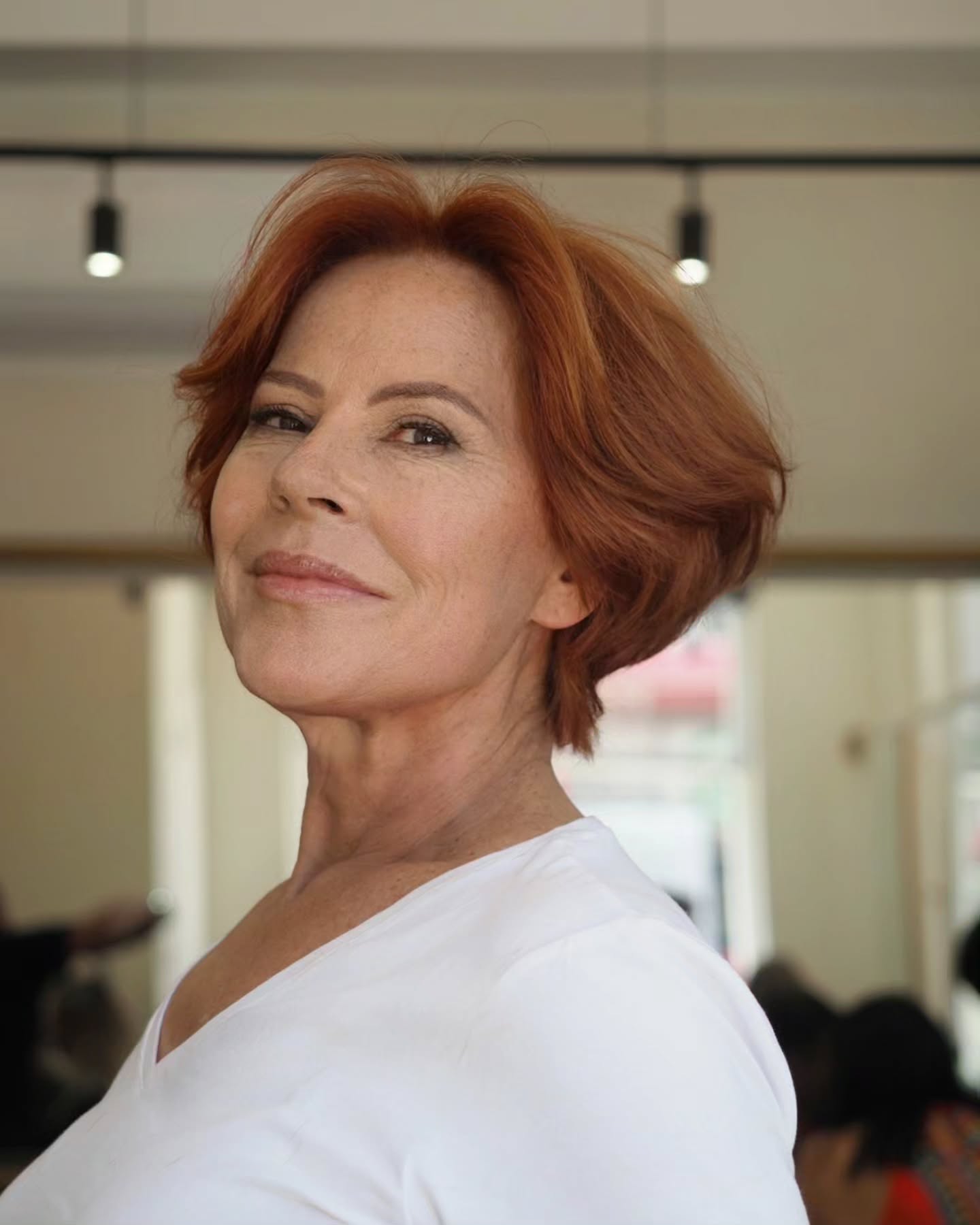 Chic Textured Pixie Bob with Rich Auburn Tones