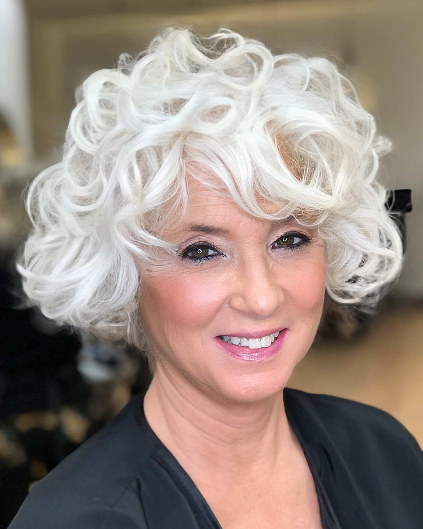 Playful Curly Pixie Bob with Soft Layers