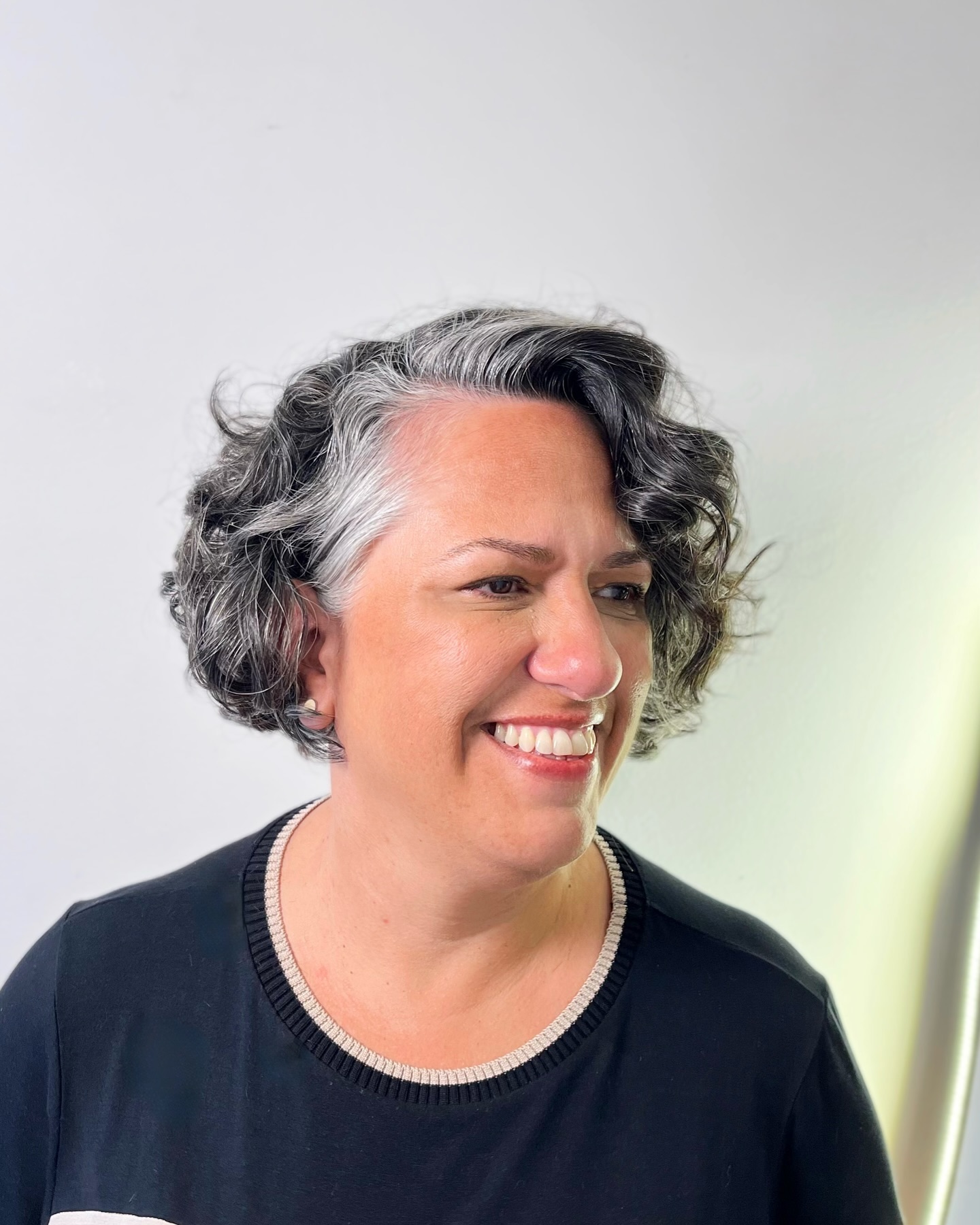 Stylish Textured Pixie Bob with Defined Curls