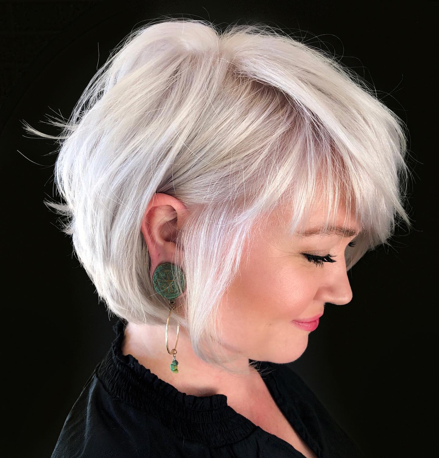 Chic Feathered Short Cut with Bright Platinum Highlights