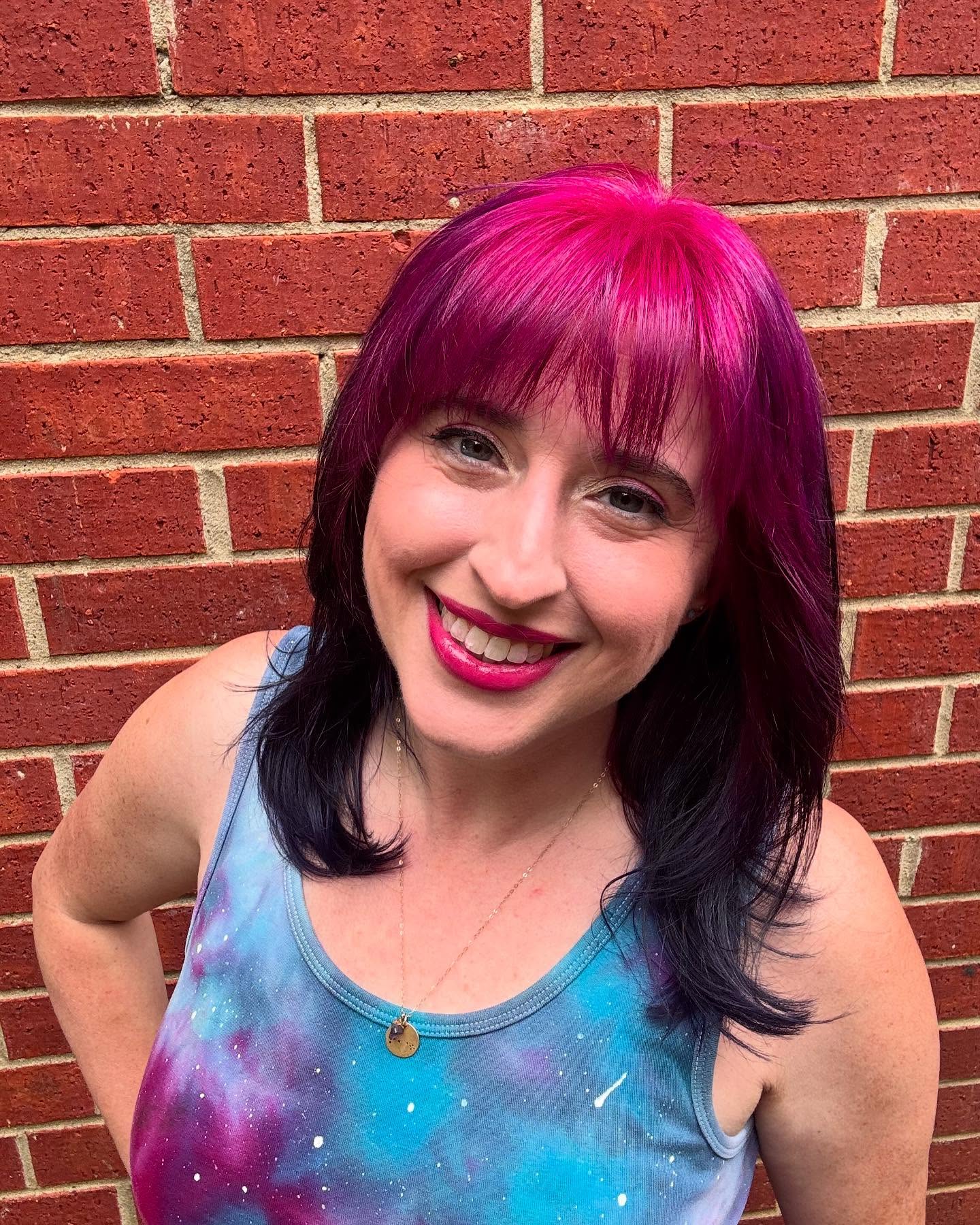 Dynamic Fuchsia and Midnight Layers with Soft Bangs