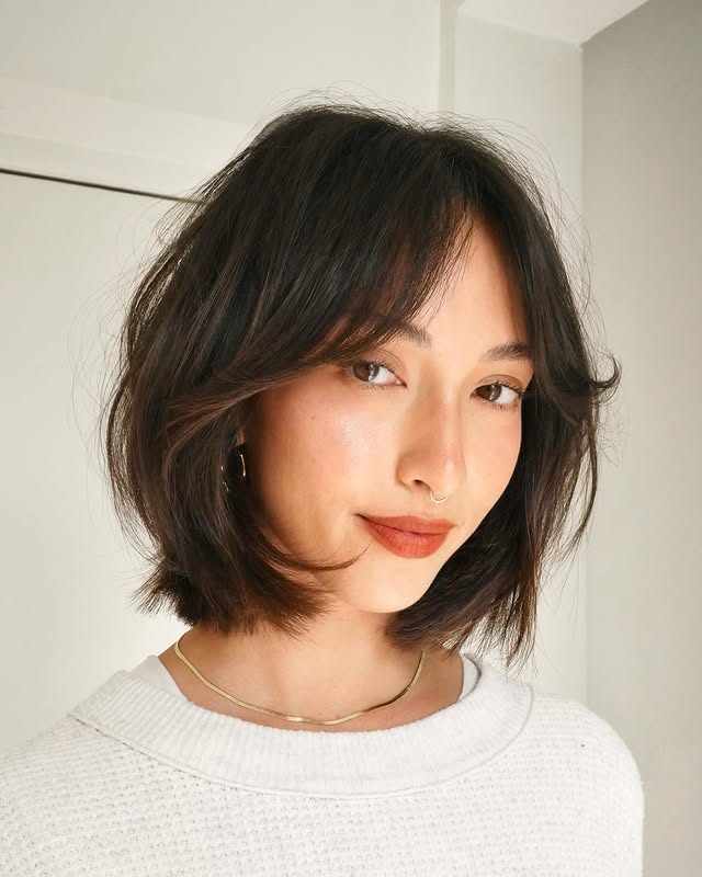 Effortlessly Chic Layered Lob with Soft Bangs