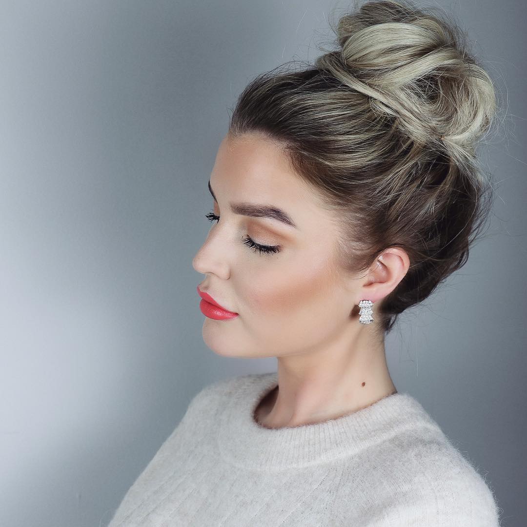 Elegant High Bun with Soft Highlights