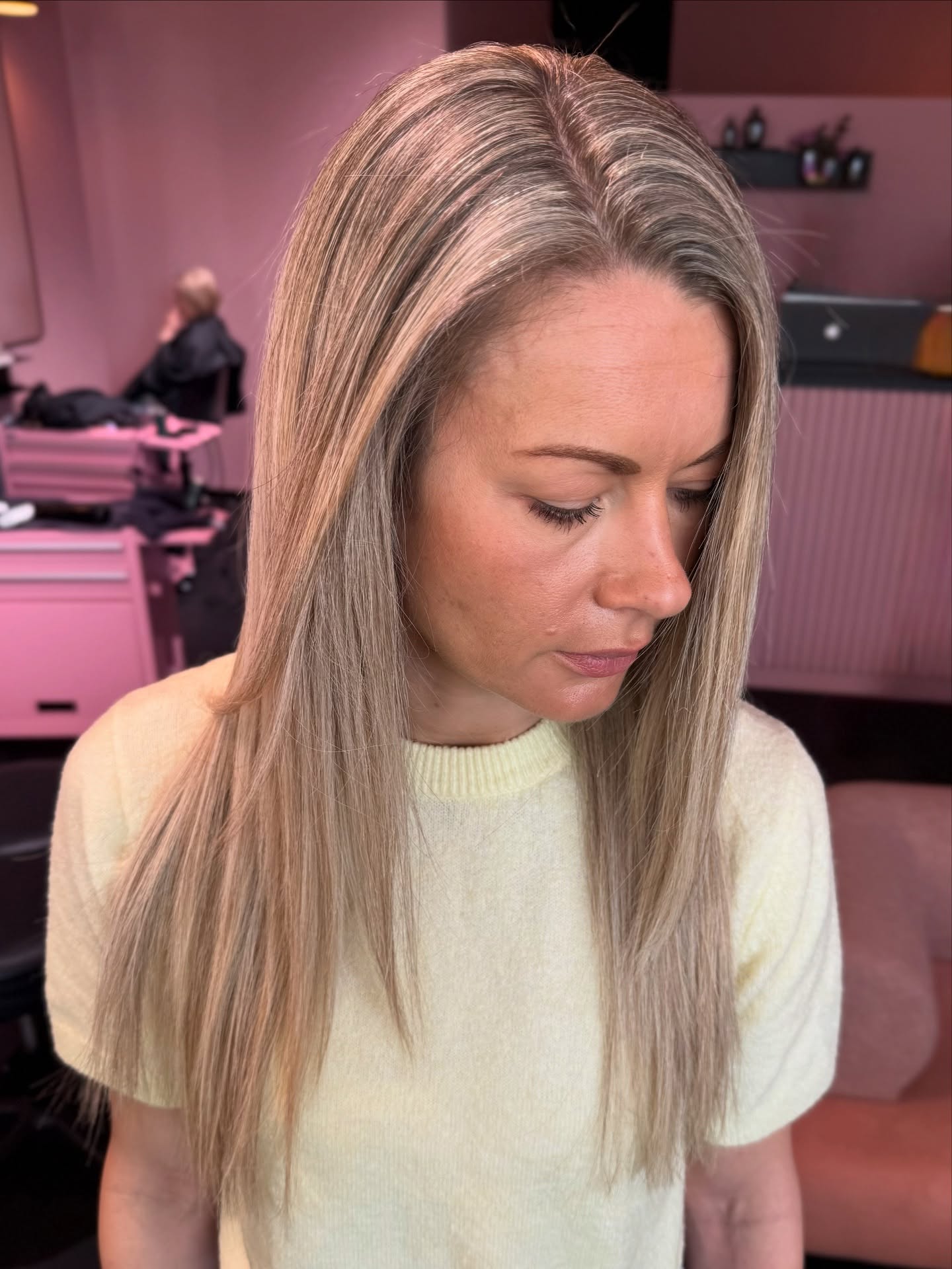 Long Sleek Cut with Subtle Ash Blonde Highlights
