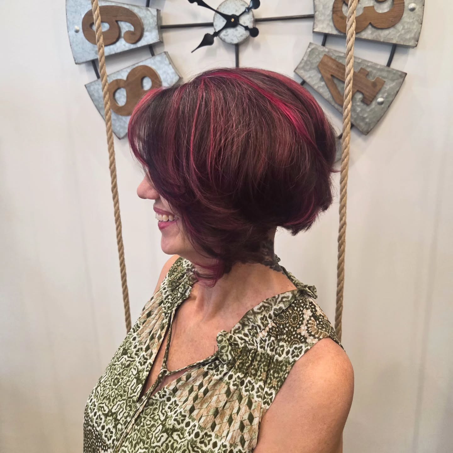 Playful Burgundy Layered Bob with Bold Highlights