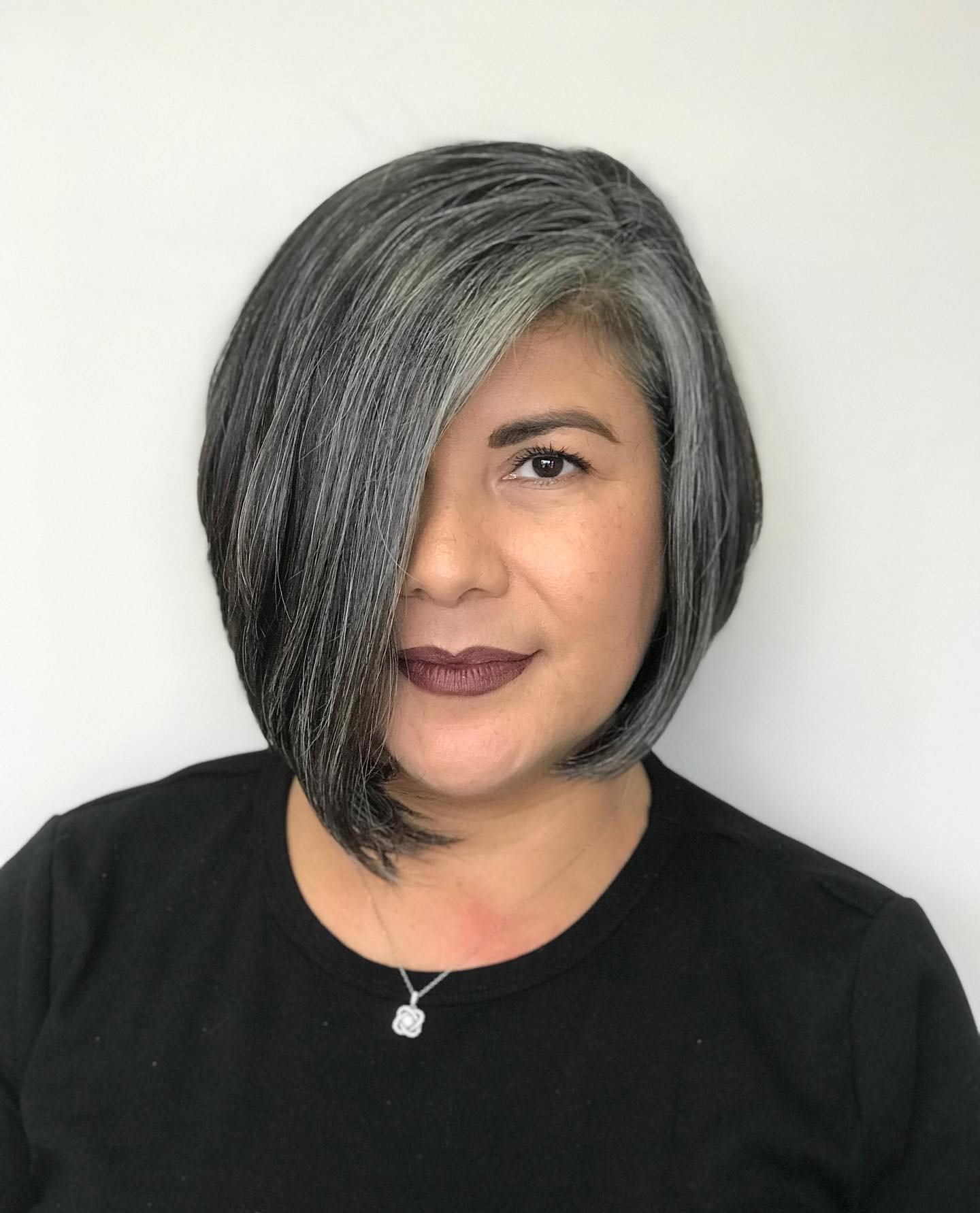 Sleek Asymmetrical Silver Bob with Side-Swept Bangs