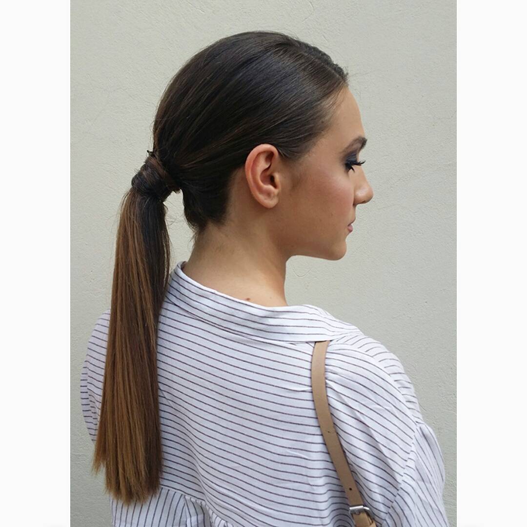 Sleek Low Ponytail with a Twist