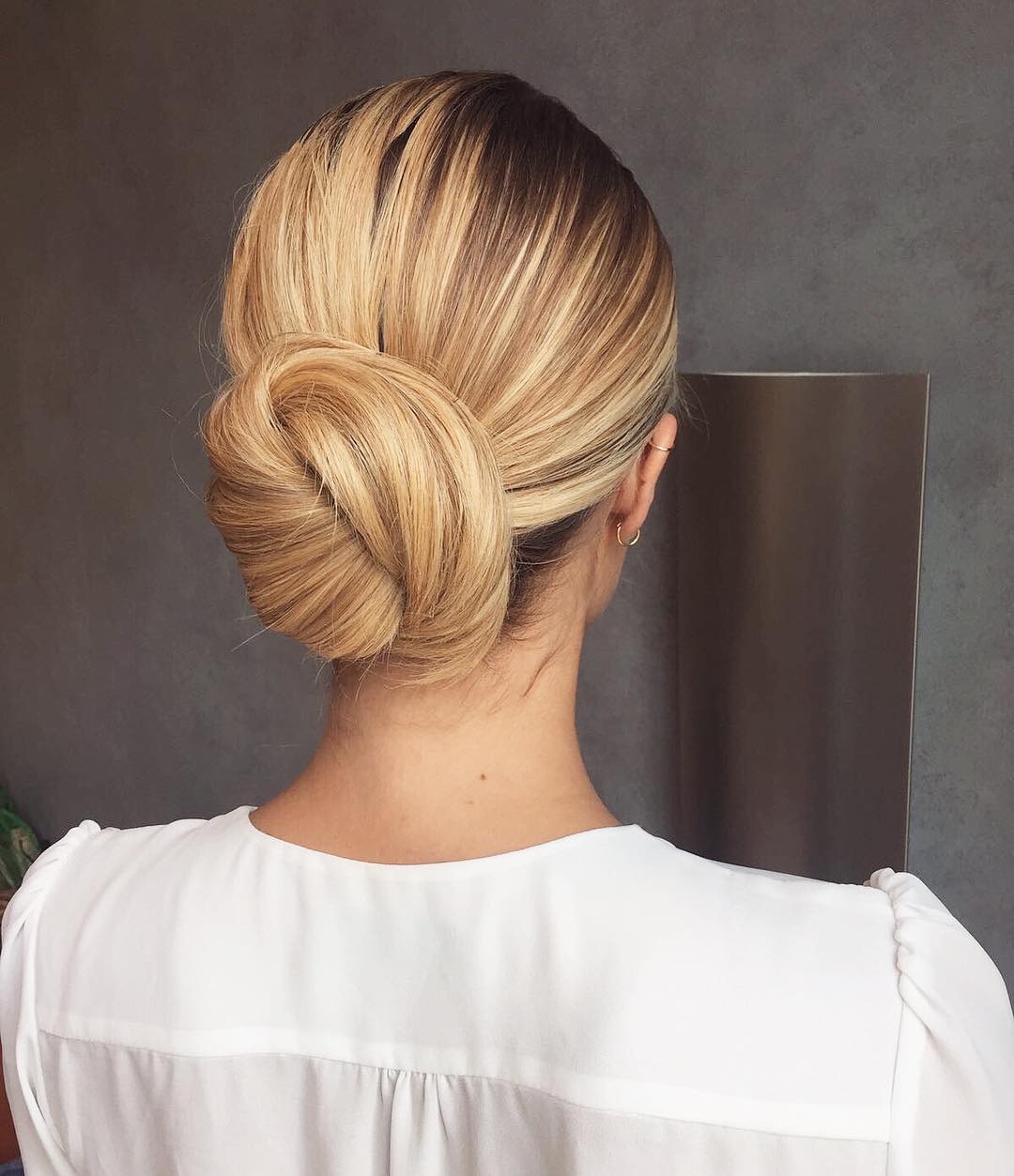 Sleek Low Twisted Bun with Soft Shine