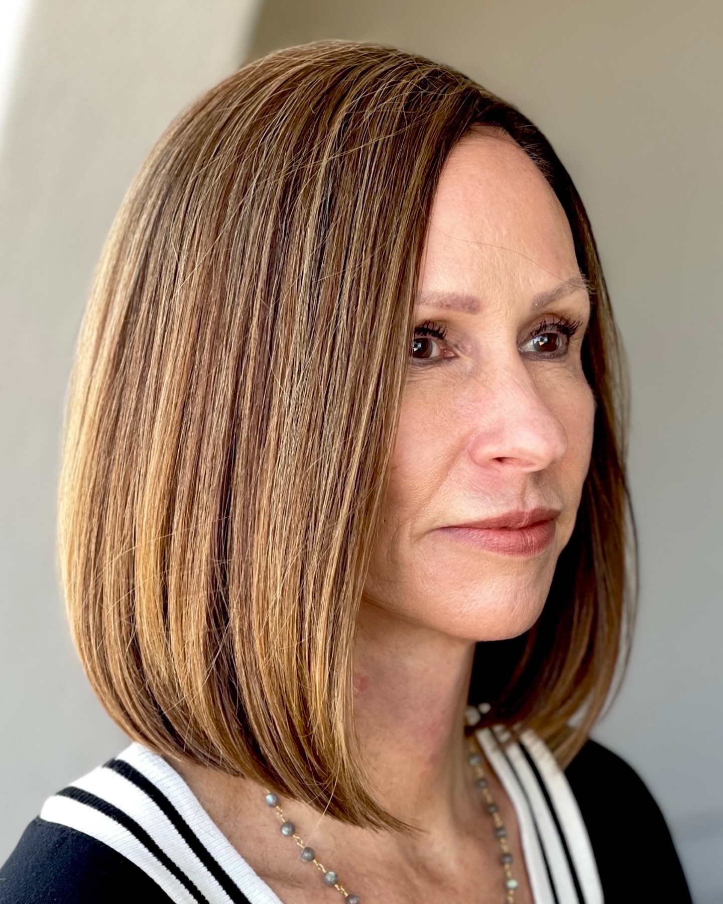 Sleek Modern A-Line Bob with Subtle Caramel Highlights