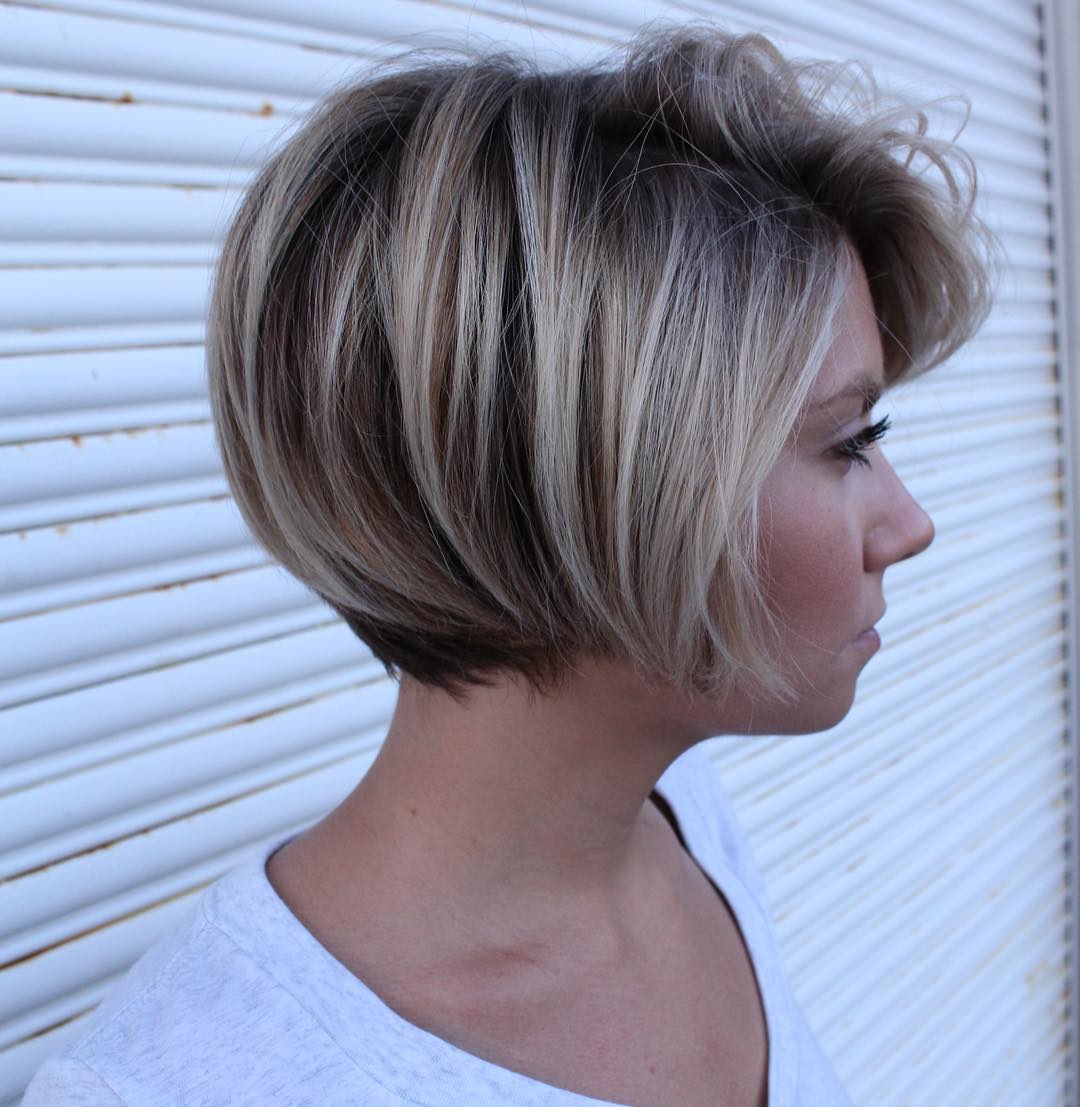 Sleek Textured Bob with Subtle Caramel Highlights