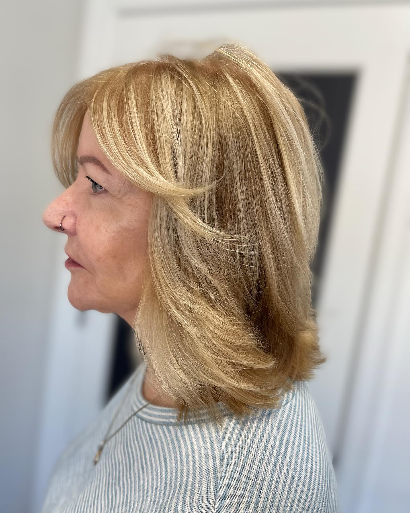 Soft Textured Mid-Length Cut with Subtle Highlights