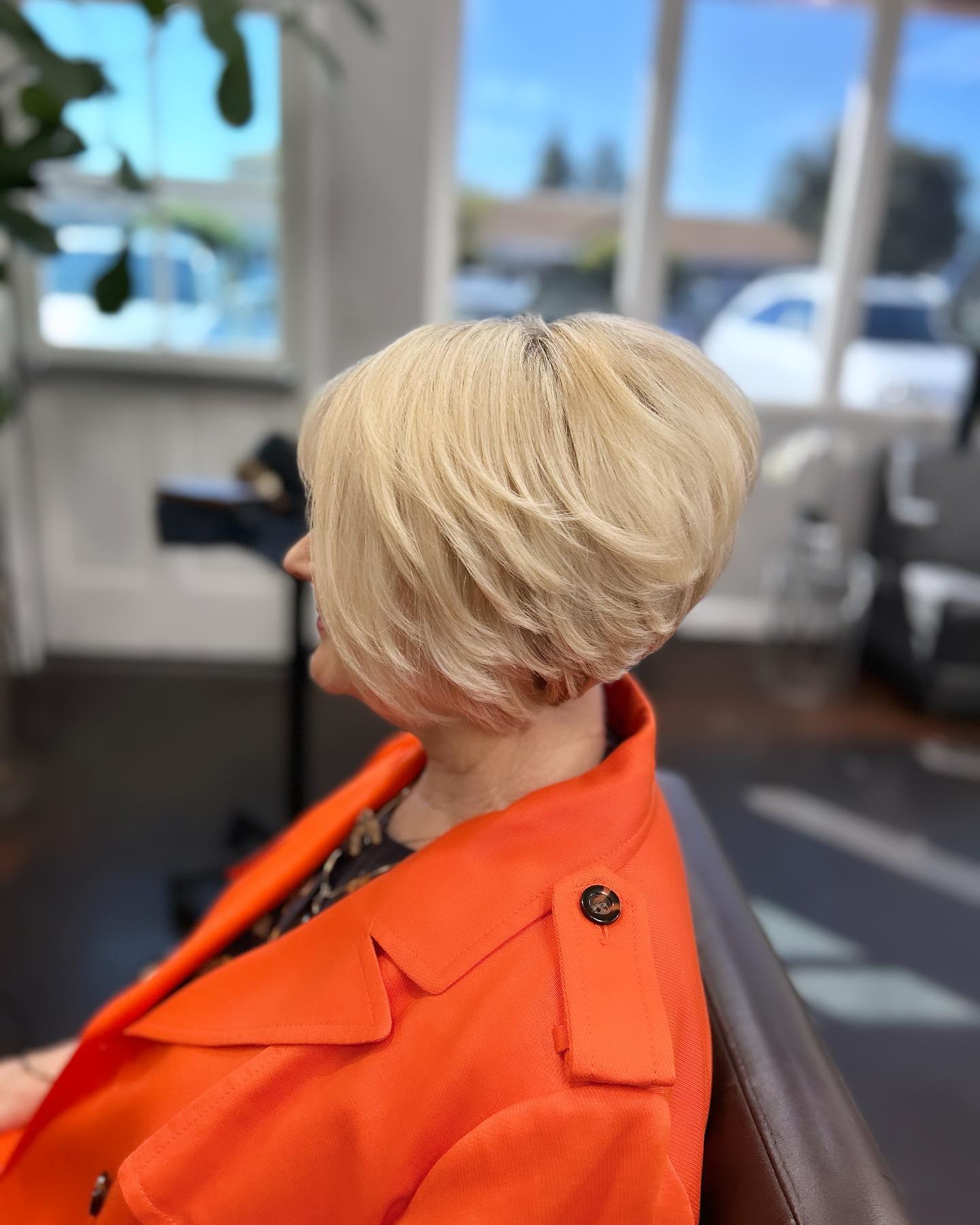 Softly Layered Blonde Slope Bob with Gentle Movement