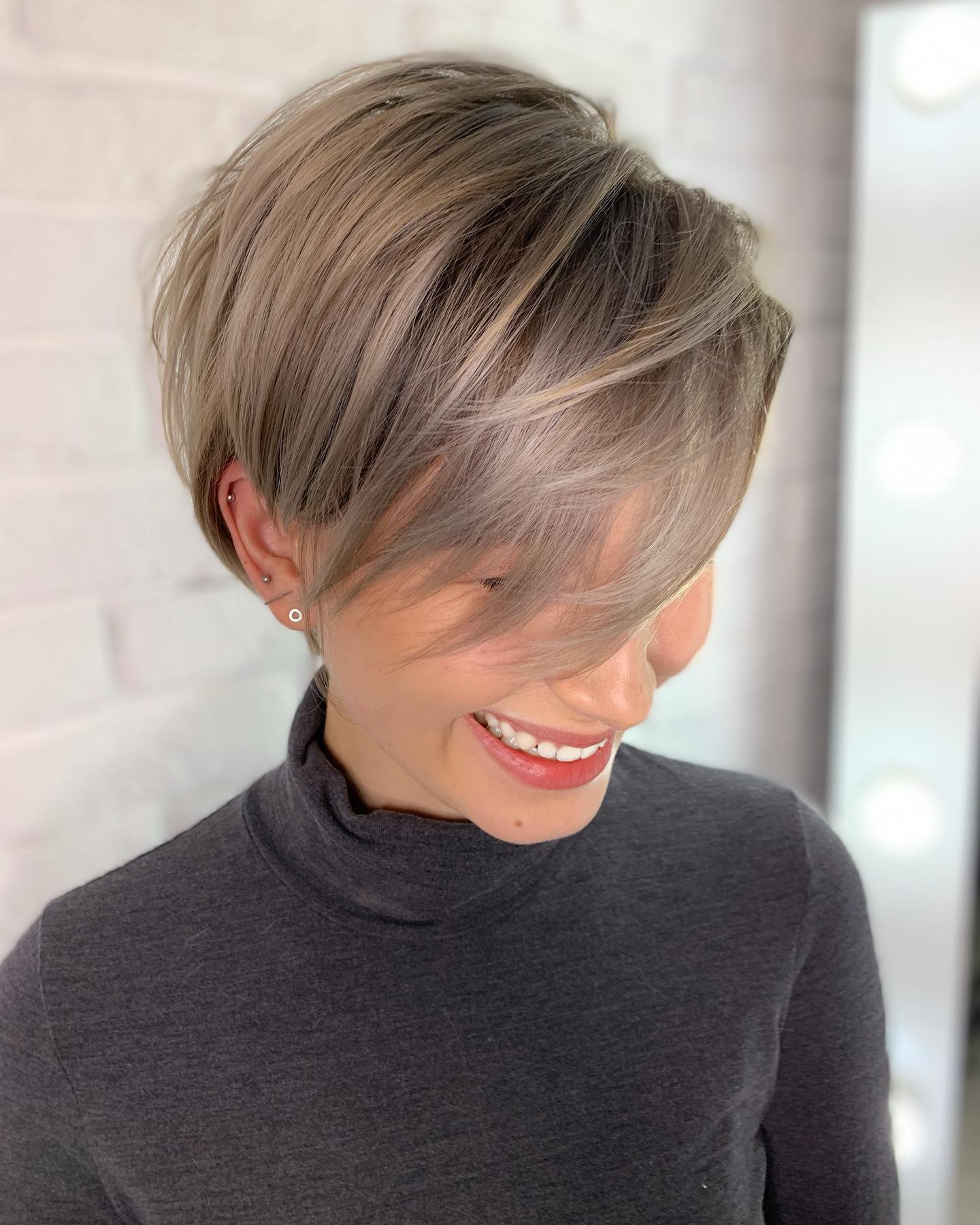 Softly Textured Short Cut with Subtle Silver Highlights