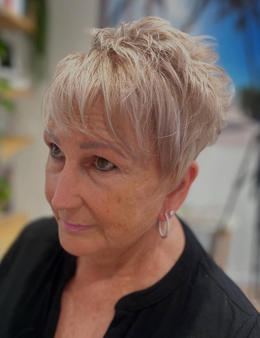 Textured Ash Blonde Pixie with Playful Layers