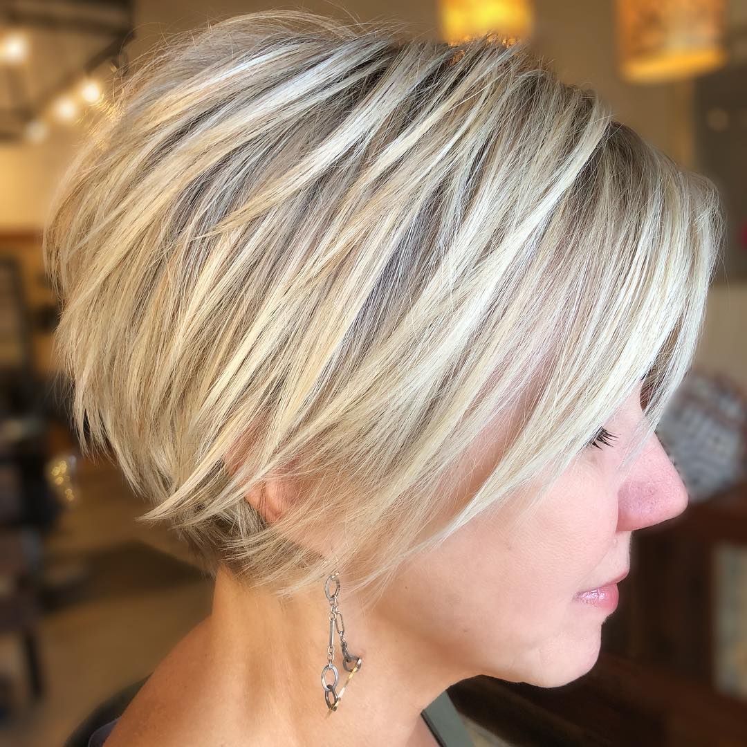 Textured Short Blonde Cut with Subtle Highlights