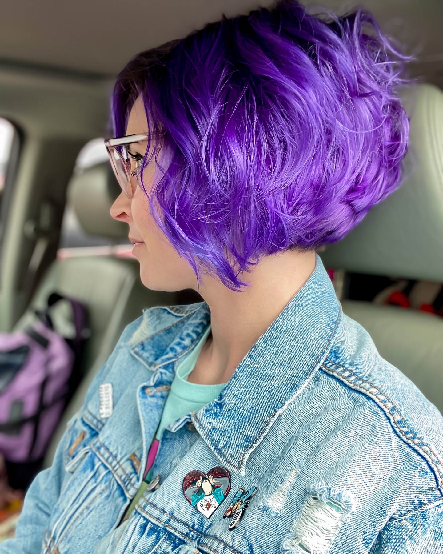 Vibrant Layered Purple Slope Bob with Textured Ends