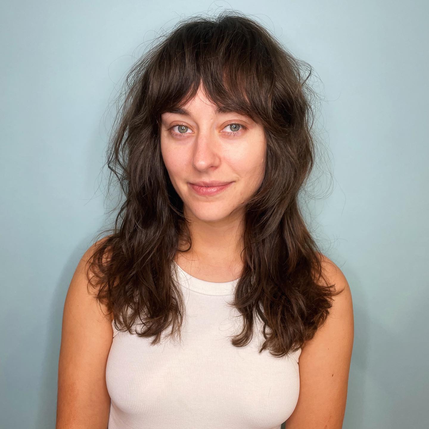 Textured Long Layers with Curtain Bangs