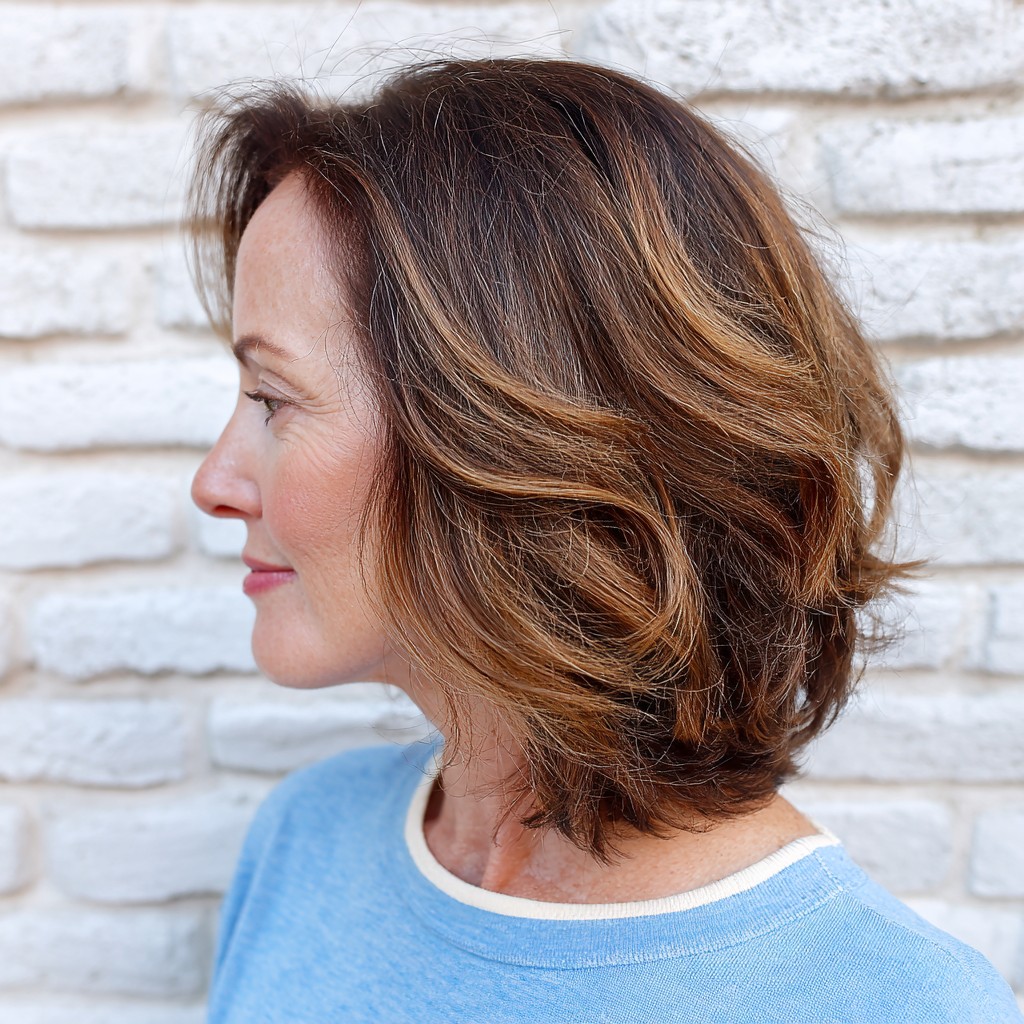 chic layered choppy bob with warm highlights