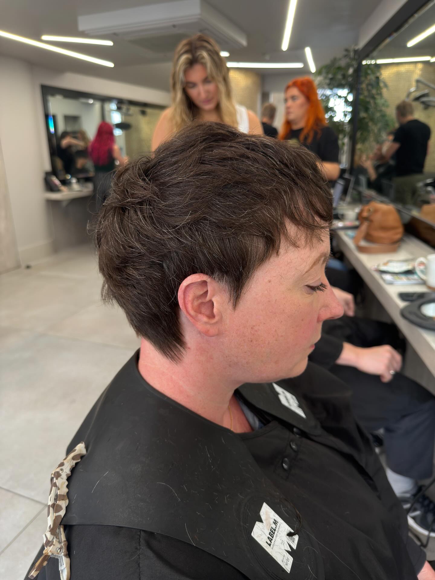 Textured Pixie Cut with Defined Layers and Edgy Texture