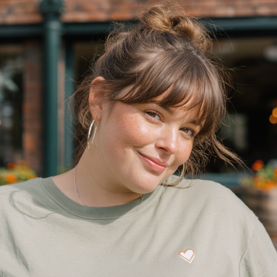 Chic Half-Up Bun with Soft Face-Framing Bangs